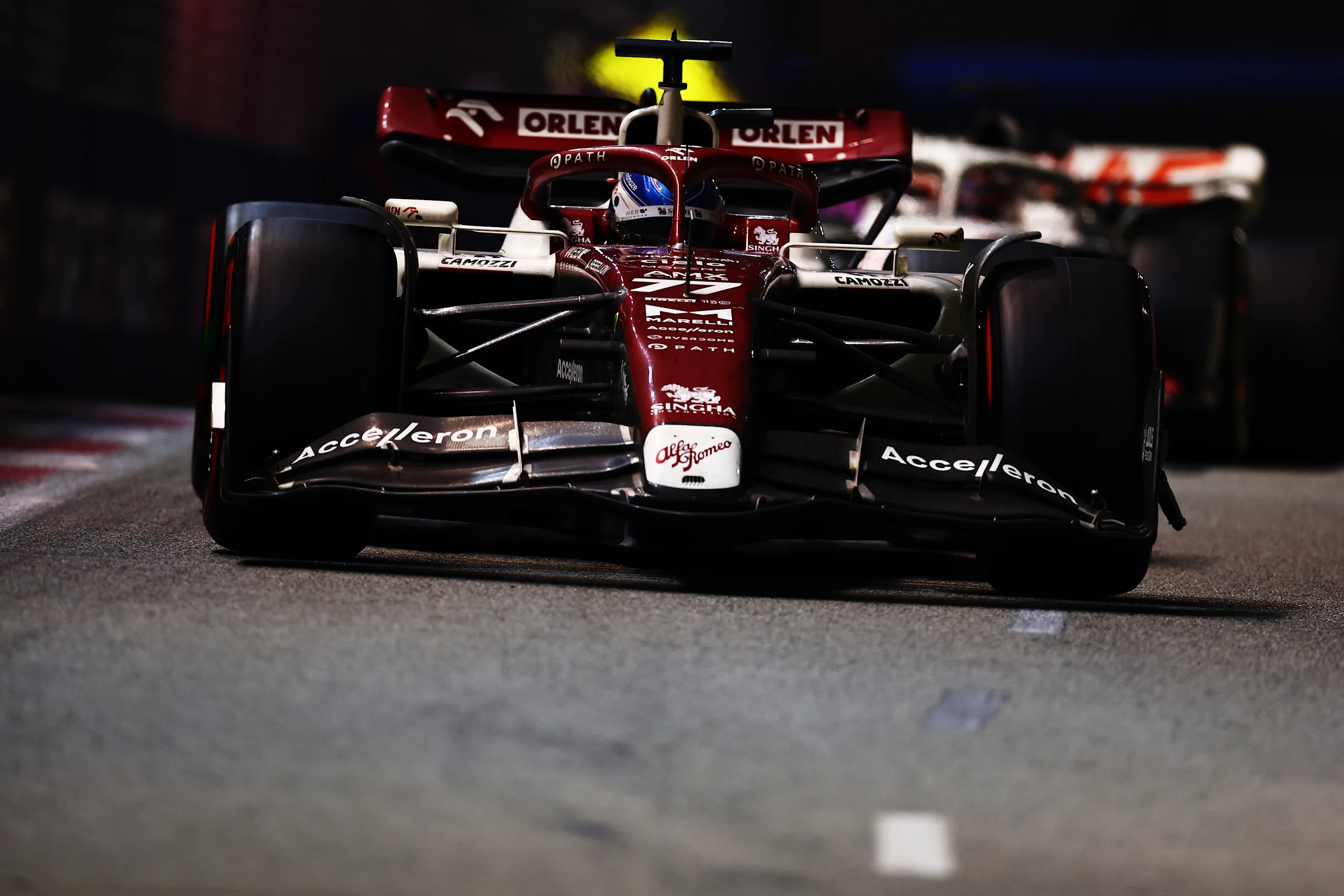 SINGAPORE, SINGAPORE - OCTOBER 02: Valtteri Bottas of Finland driving the (77) Alfa Romeo F1 C42
