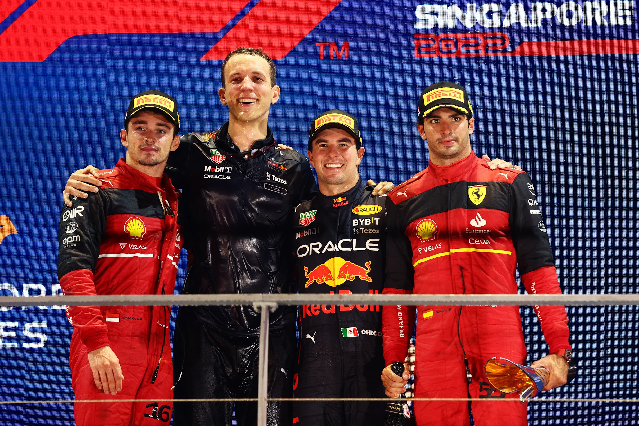 SINGAPORE, SINGAPORE - OCTOBER 02: Race winner Sergio Perez of Mexico and Oracle Red Bull Racing