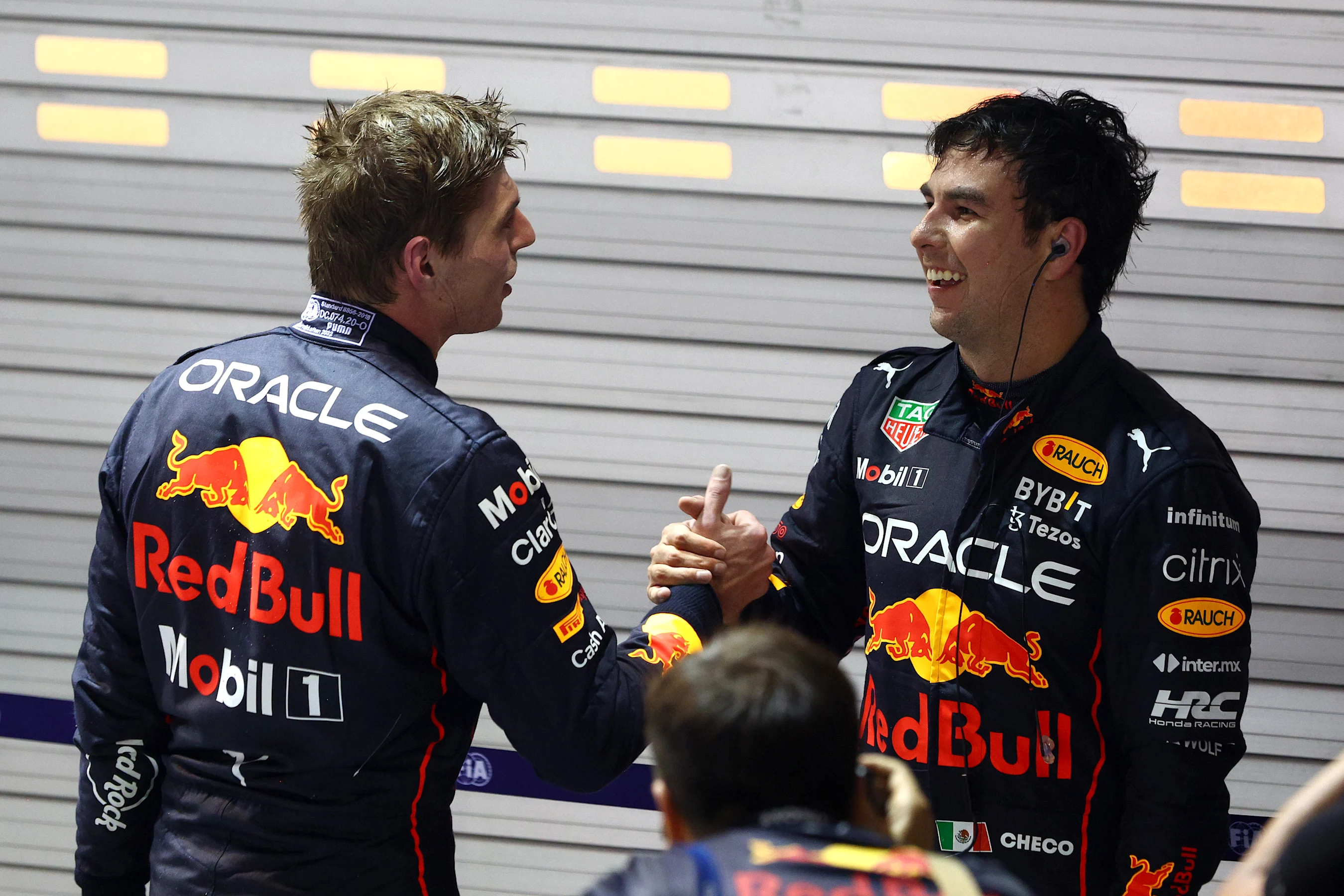 SINGAPORE, SINGAPORE - OCTOBER 02: Race winner Sergio Perez of Mexico and Oracle Red Bull Racing is