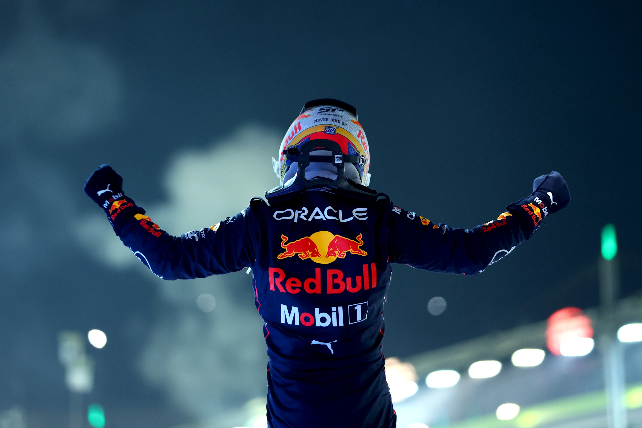 SINGAPORE, SINGAPORE - OCTOBER 02: Race winner Sergio Perez of Mexico and Oracle Red Bull Racing