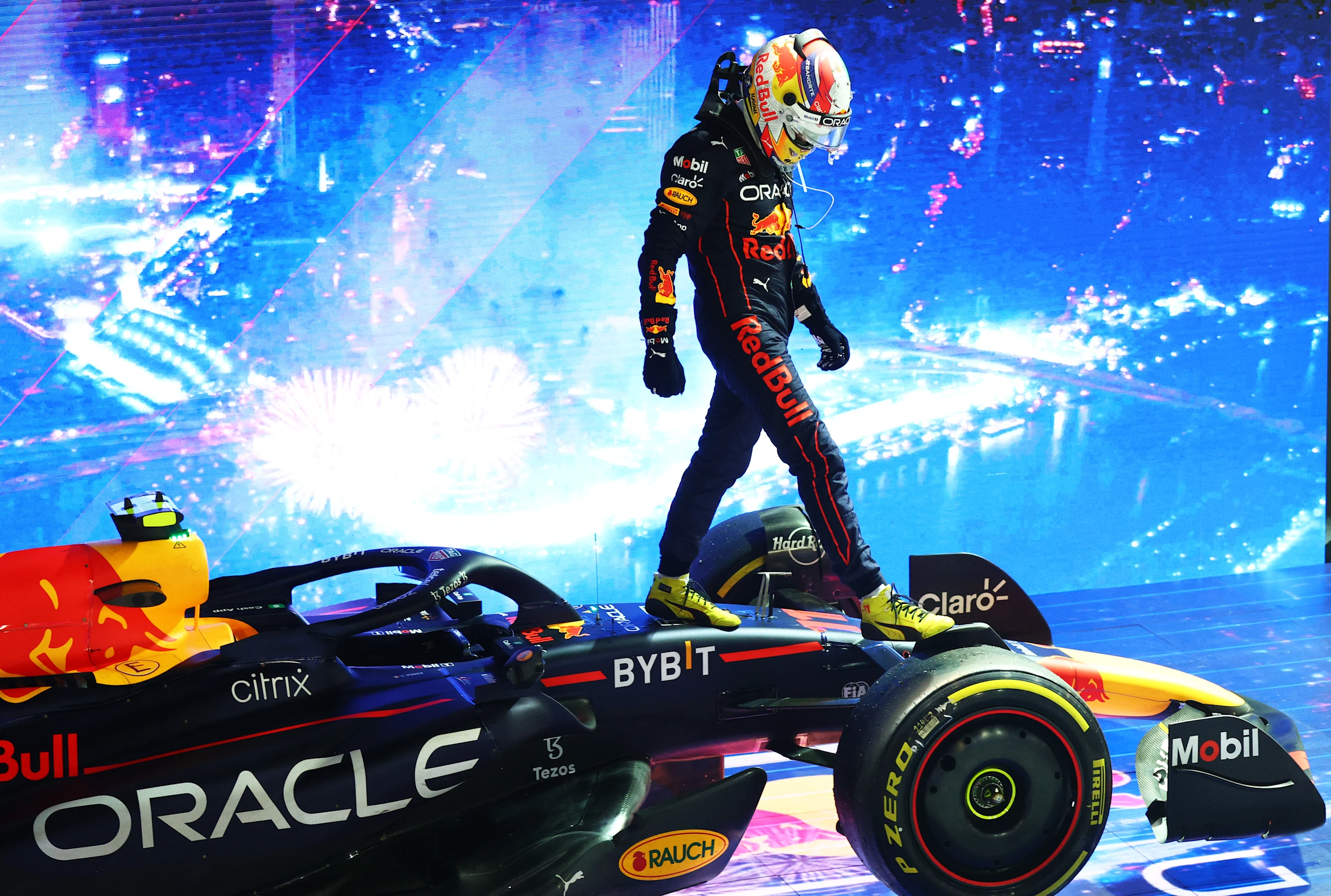 SINGAPORE, SINGAPORE - OCTOBER 02: Race winner Sergio Perez of Mexico and Oracle Red Bull Racing
