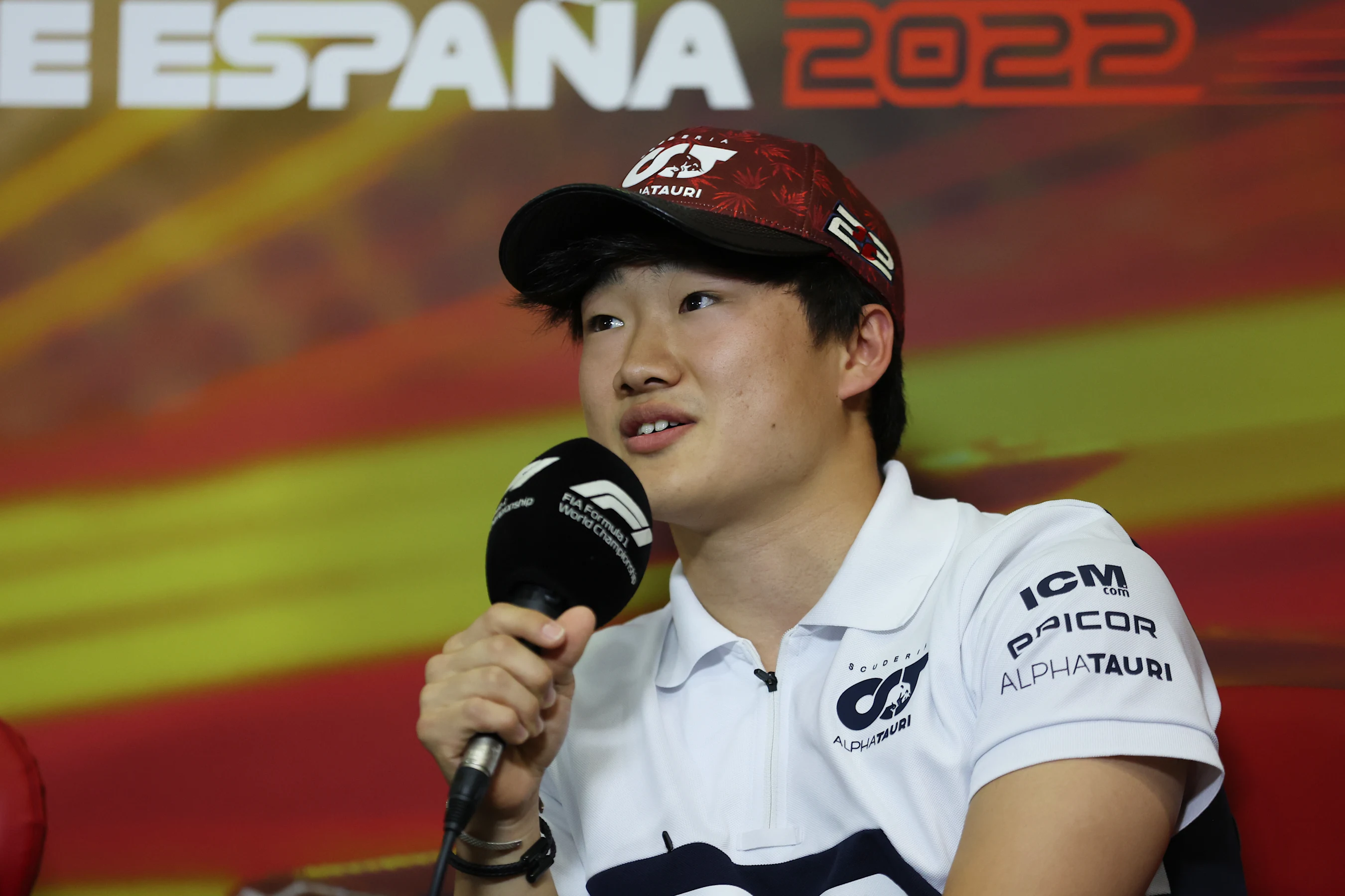 BARCELONA, SPAIN - MAY 20: Yuki Tsunoda of Japan and Scuderia AlphaTauri talks in the Drivers Press