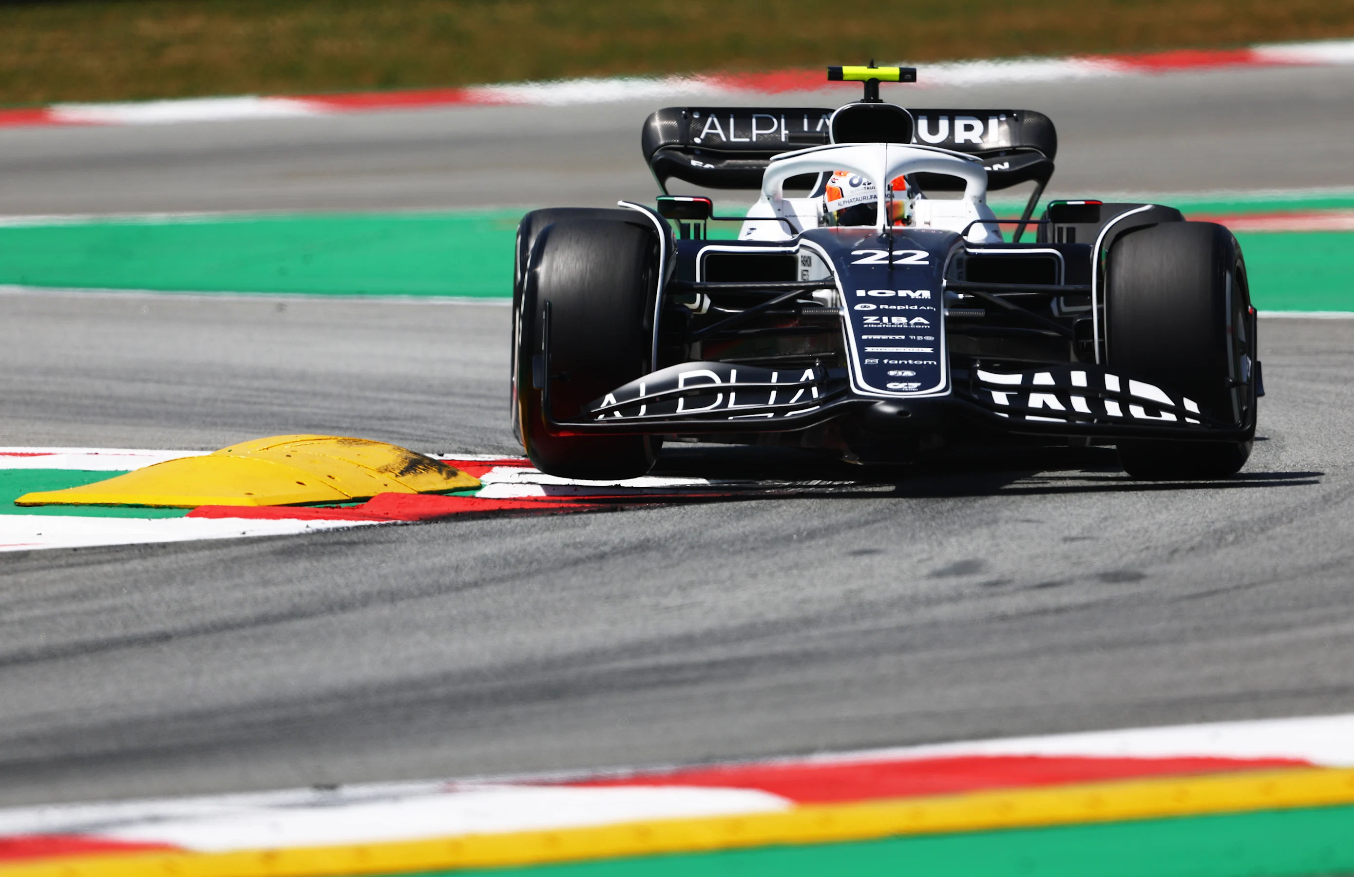BARCELONA, SPAIN - MAY 21: Yuki Tsunoda of Japan driving the (22) Scuderia AlphaTauri AT03 on track