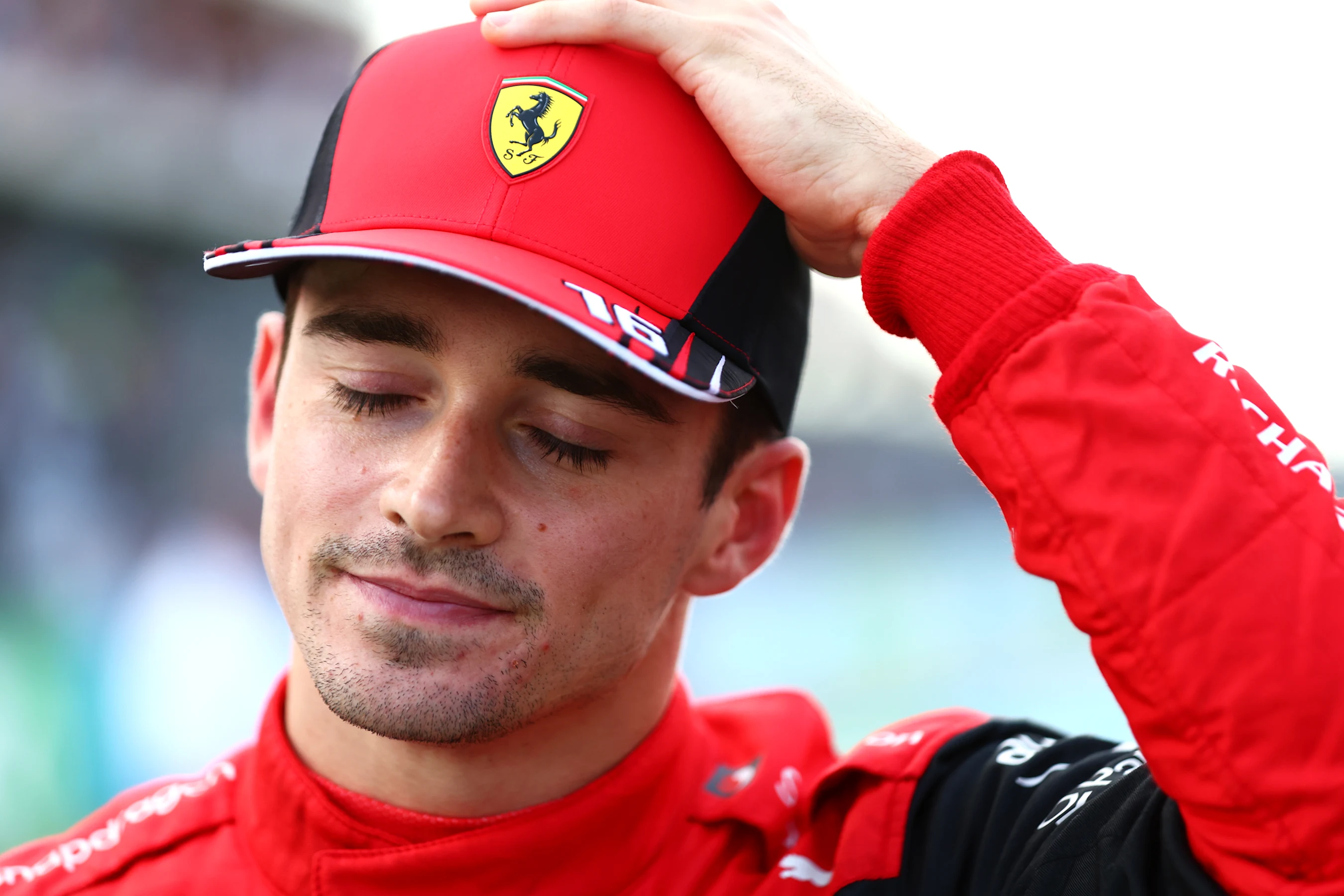 AUSTIN, TEXAS - OCTOBER 22: Second placed qualifier Charles Leclerc of Monaco and Ferrari looks on