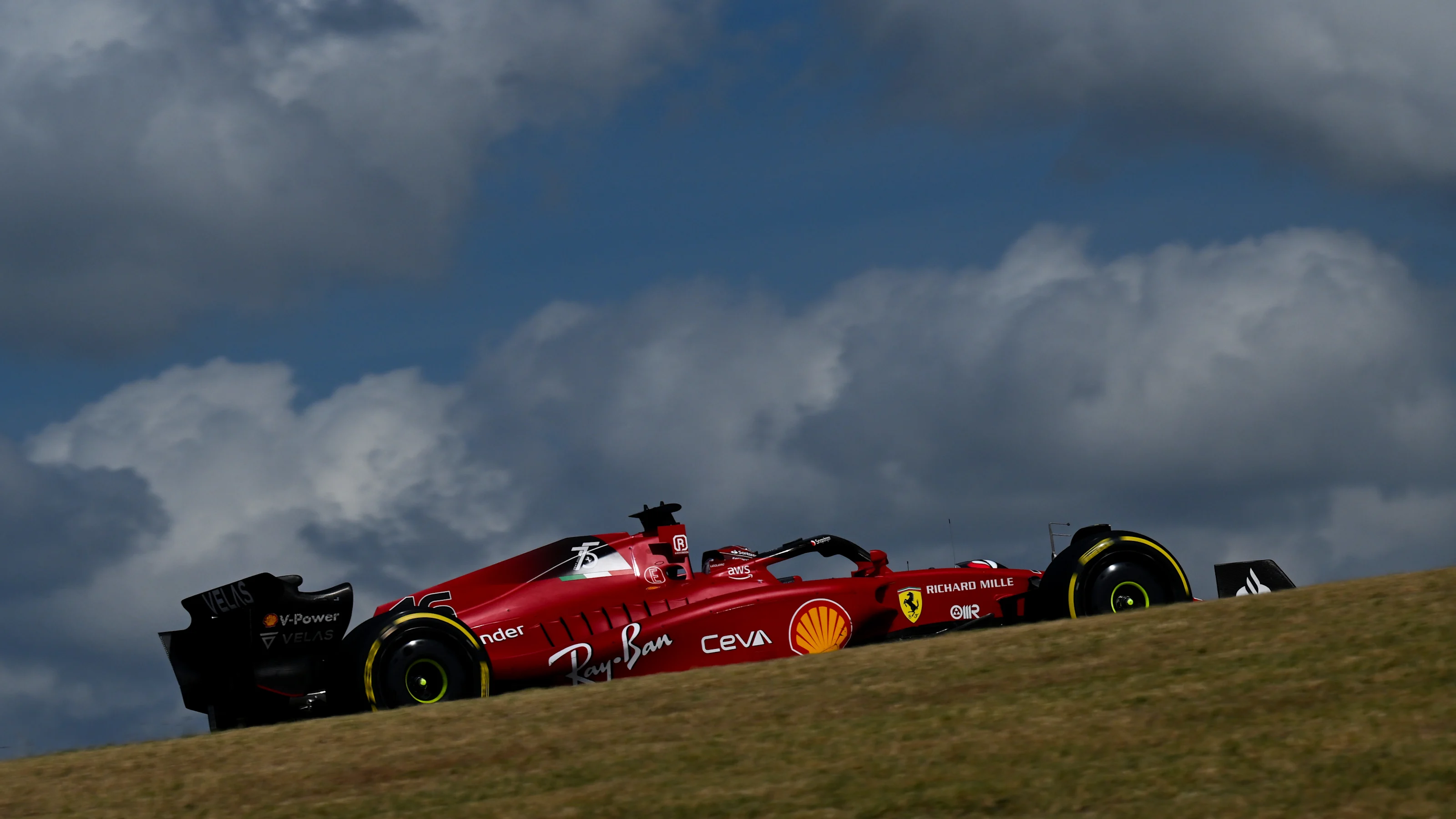 AUSTIN, TEXAS - OCTOBER 23: Charles Leclerc of Monaco driving (16) the Ferrari F1-75 on track