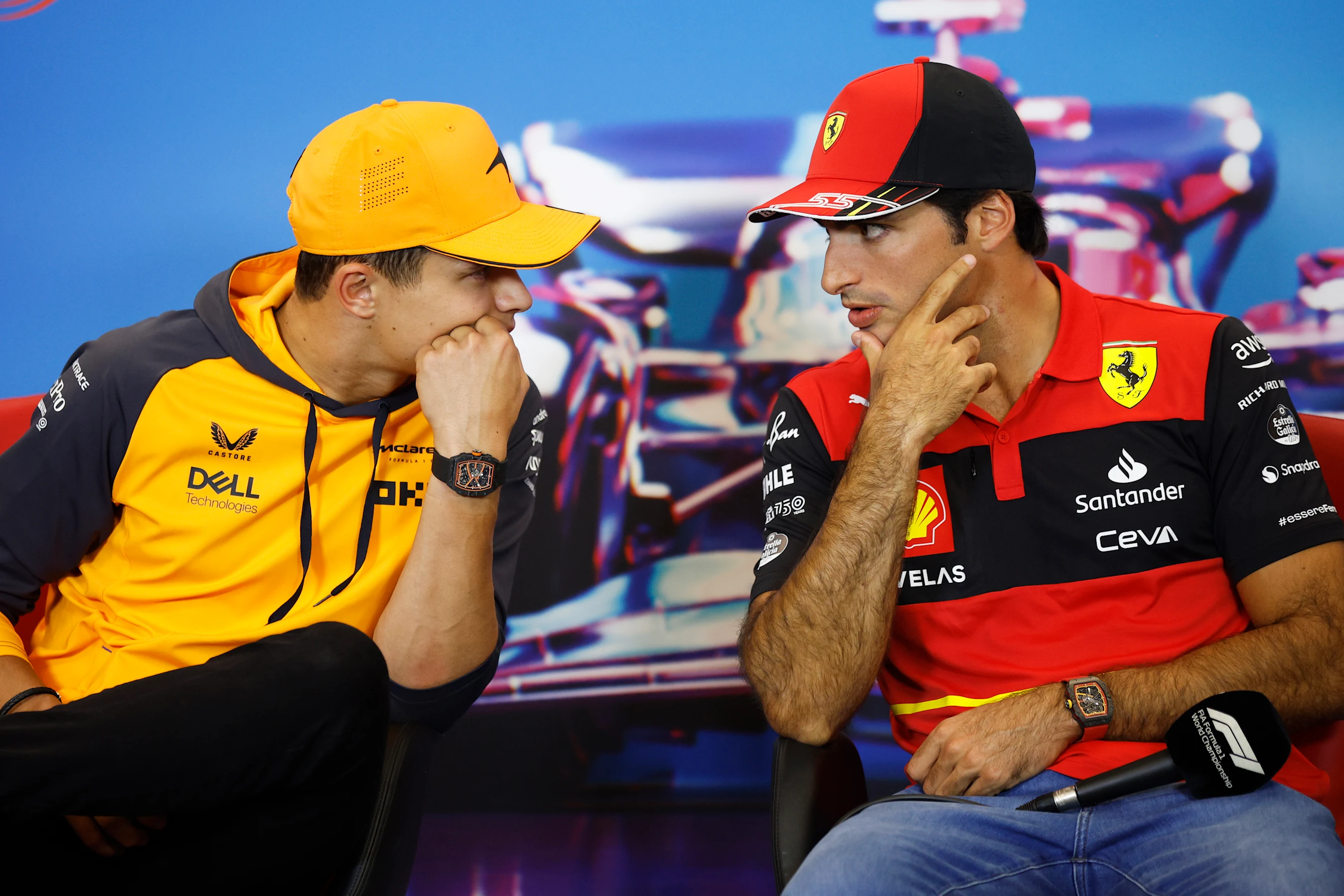 AUSTIN, TEXAS - OCTOBER 20: Lando Norris of Great Britain and McLaren and Carlos Sainz of Spain and