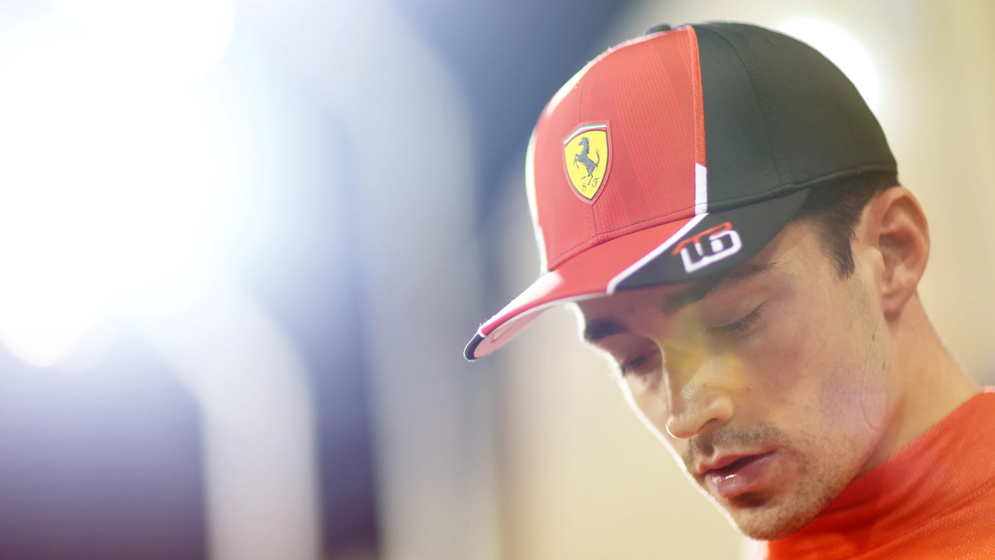 BAHRAIN, BAHRAIN - MARCH 04: Third placed qualifier Charles Leclerc of Monaco and Ferrari looks on