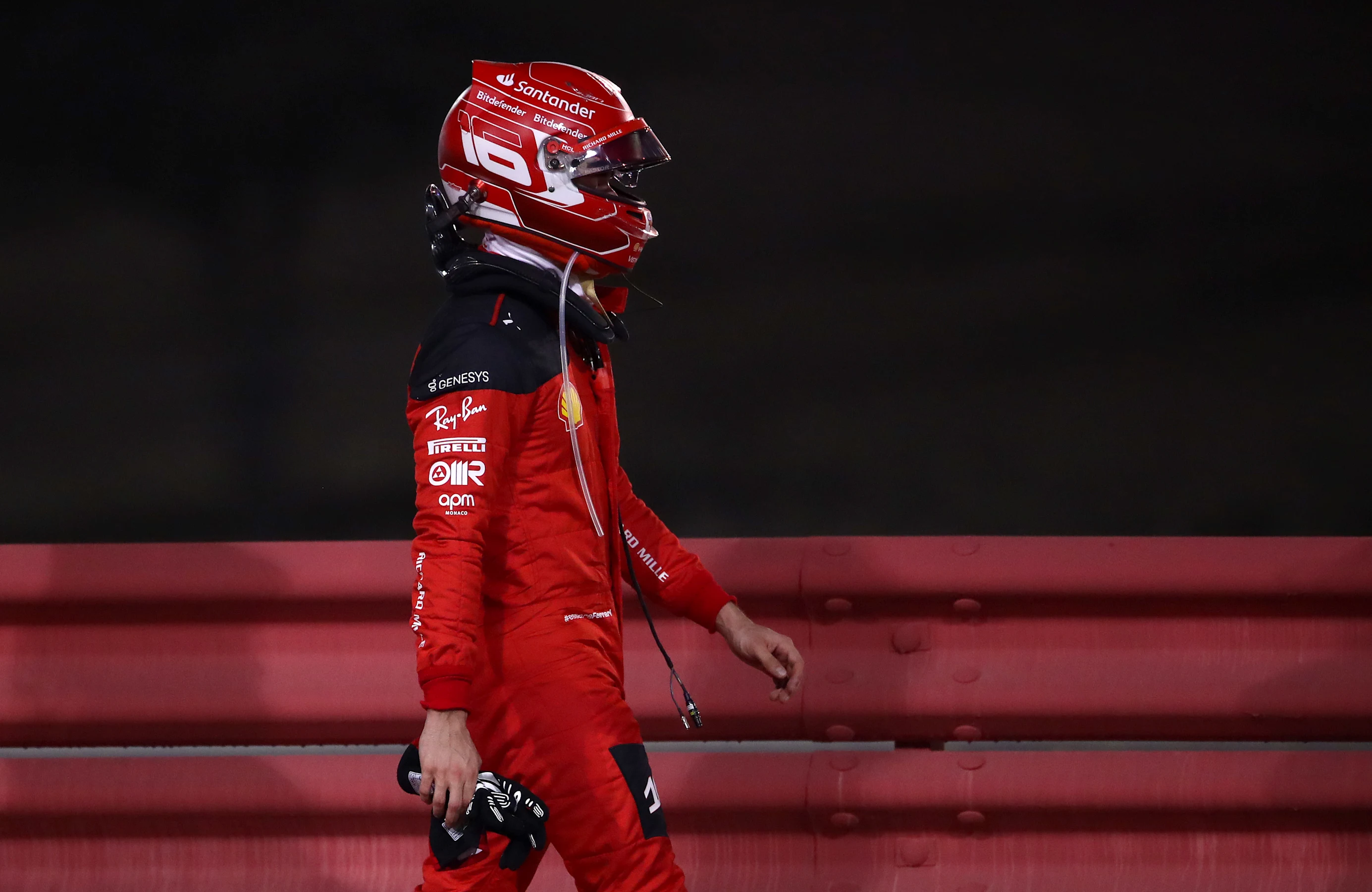 BAHRAIN, BAHRAIN - MARCH 05: Charles Leclerc of Monaco and Ferrari looks on after retiring from the