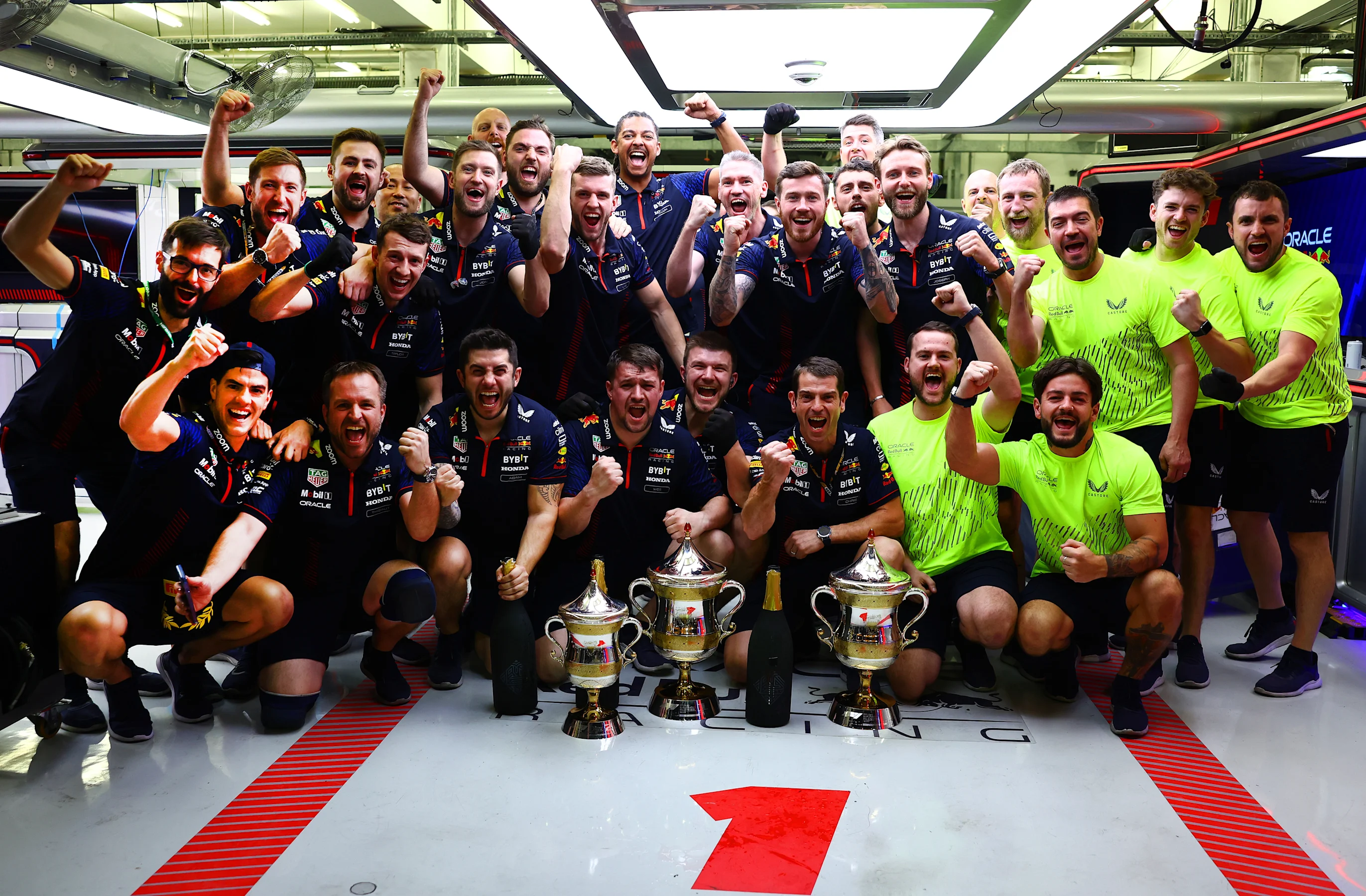 BAHRAIN, BAHRAIN - MARCH 05: The Red Bull Racing team celebrate in the garage after securing a 1-2