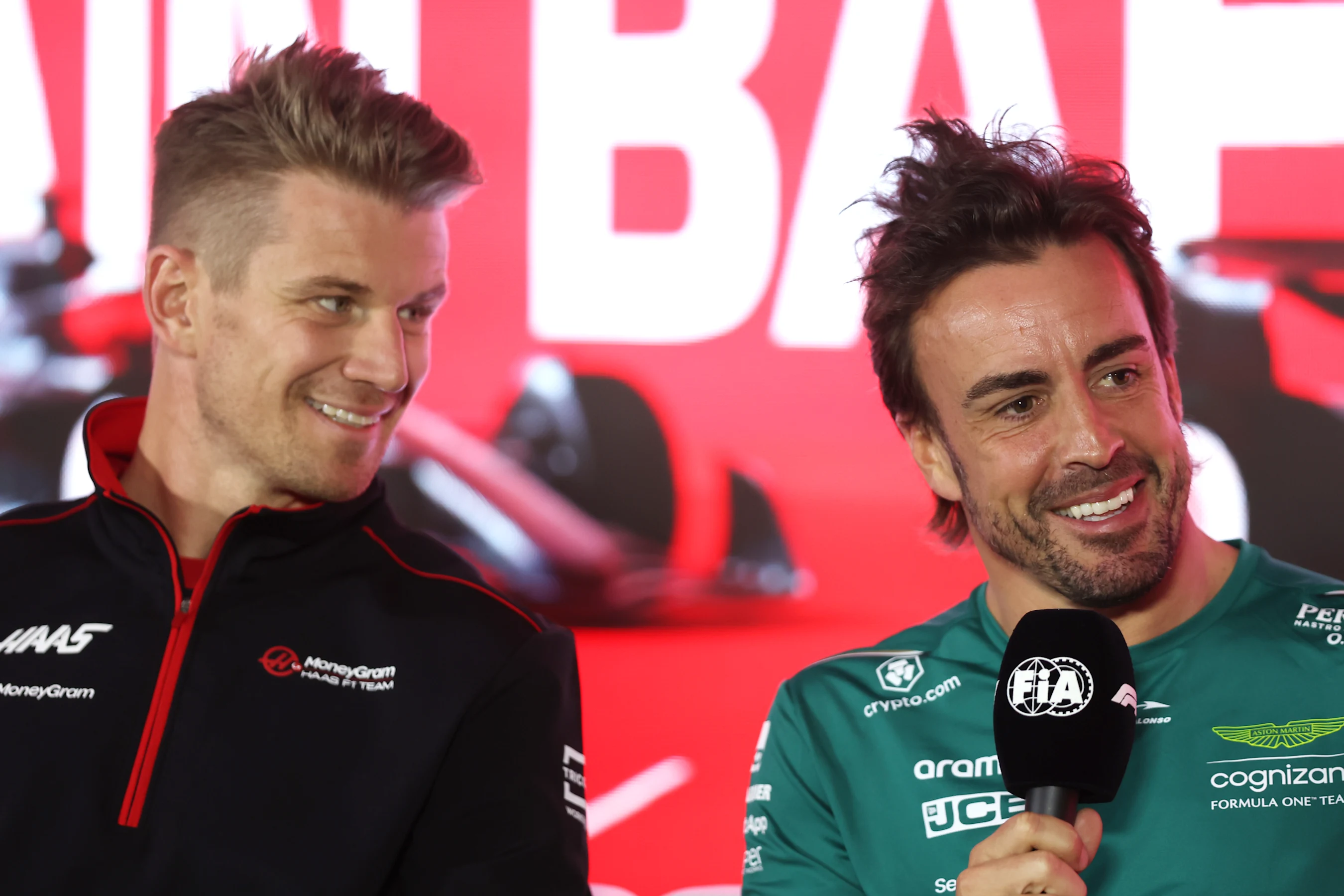 BAHRAIN, BAHRAIN - MARCH 02: Fernando Alonso of Spain and Aston Martin F1 Team and Nico Hulkenberg