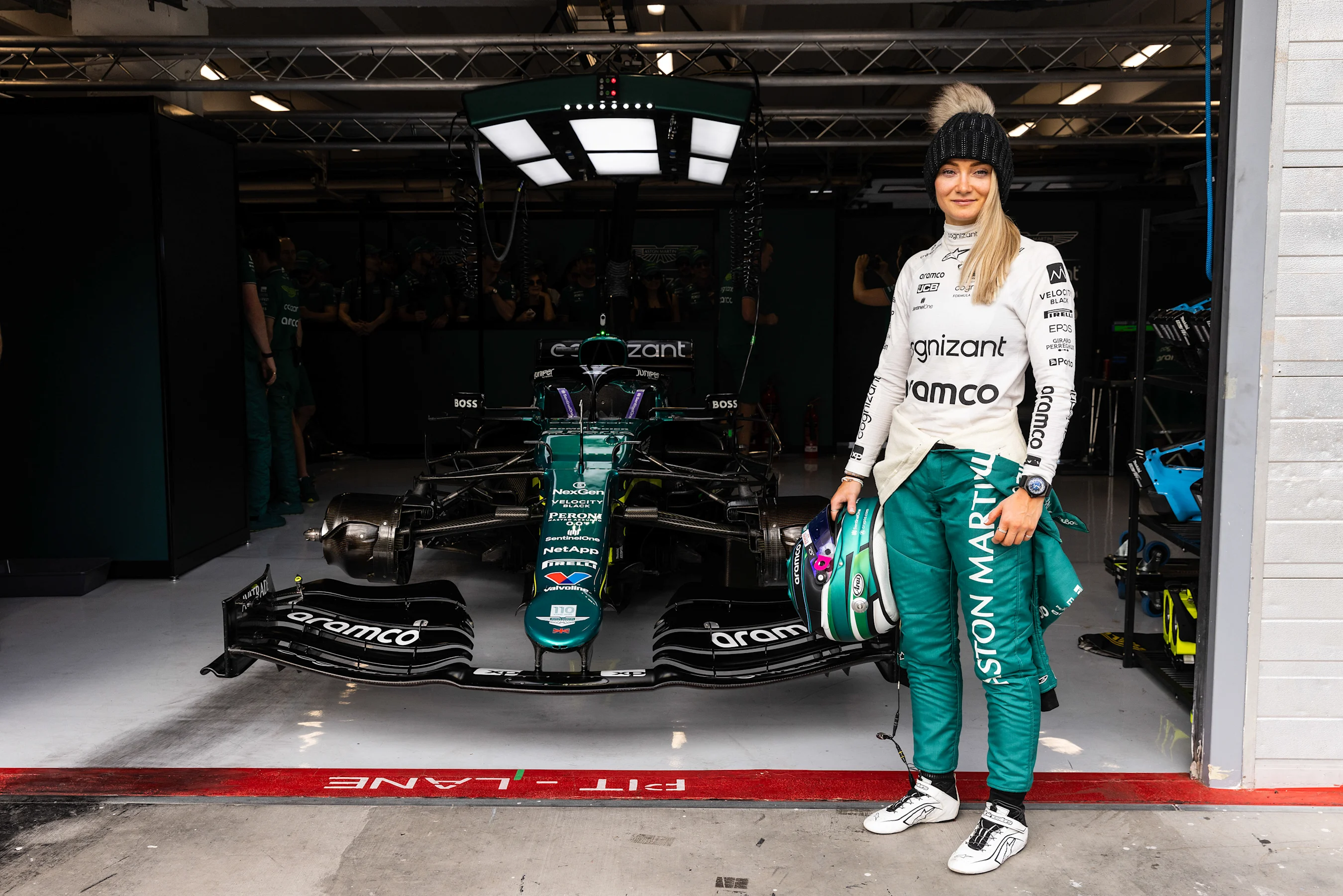 Portrait
Jessica Hawkins, Aston Martin F1 Team, poses in front of the team's garage