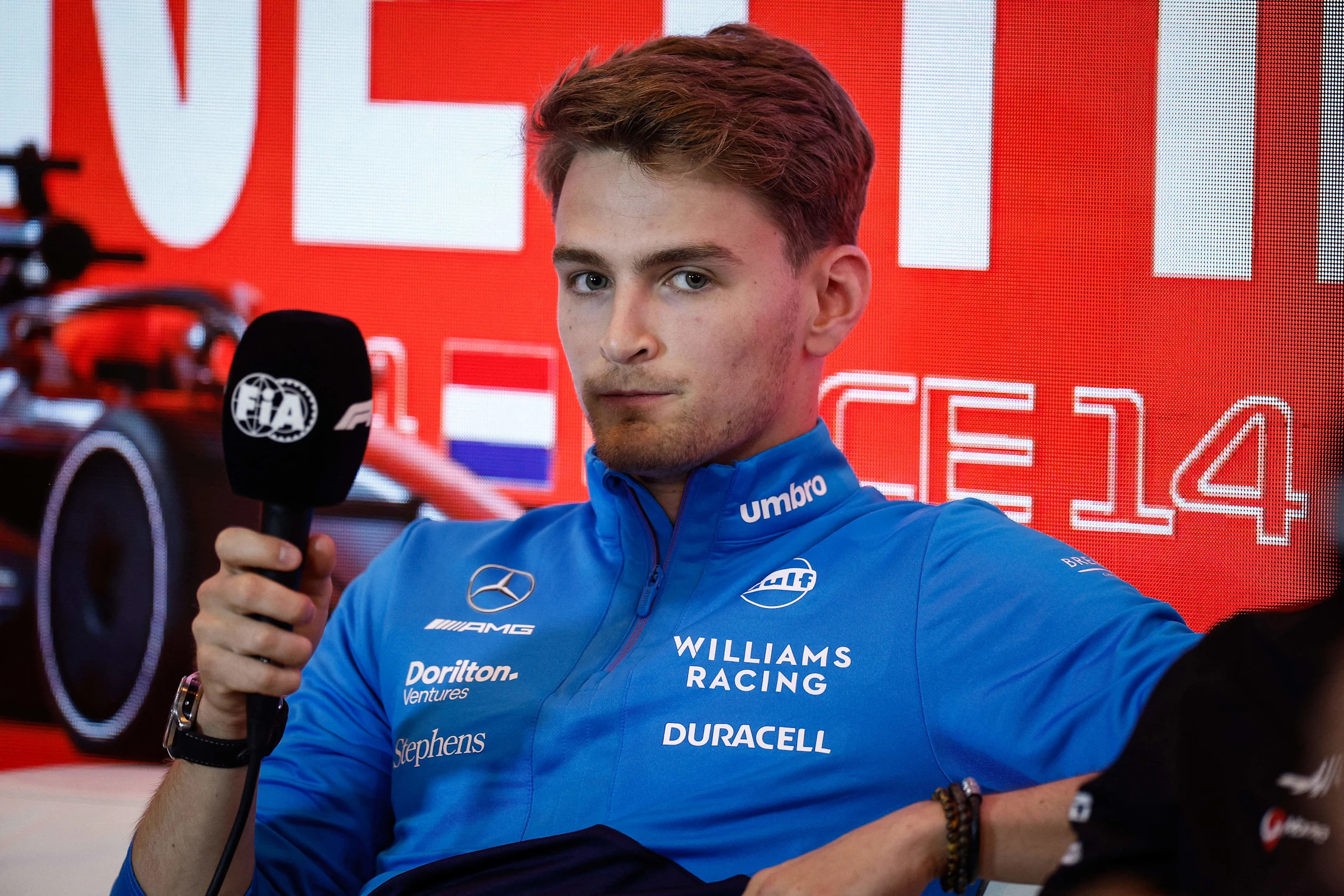 Williams' US driver Logan Sargeant looks on during a press conference ahead of the Dutch Formula