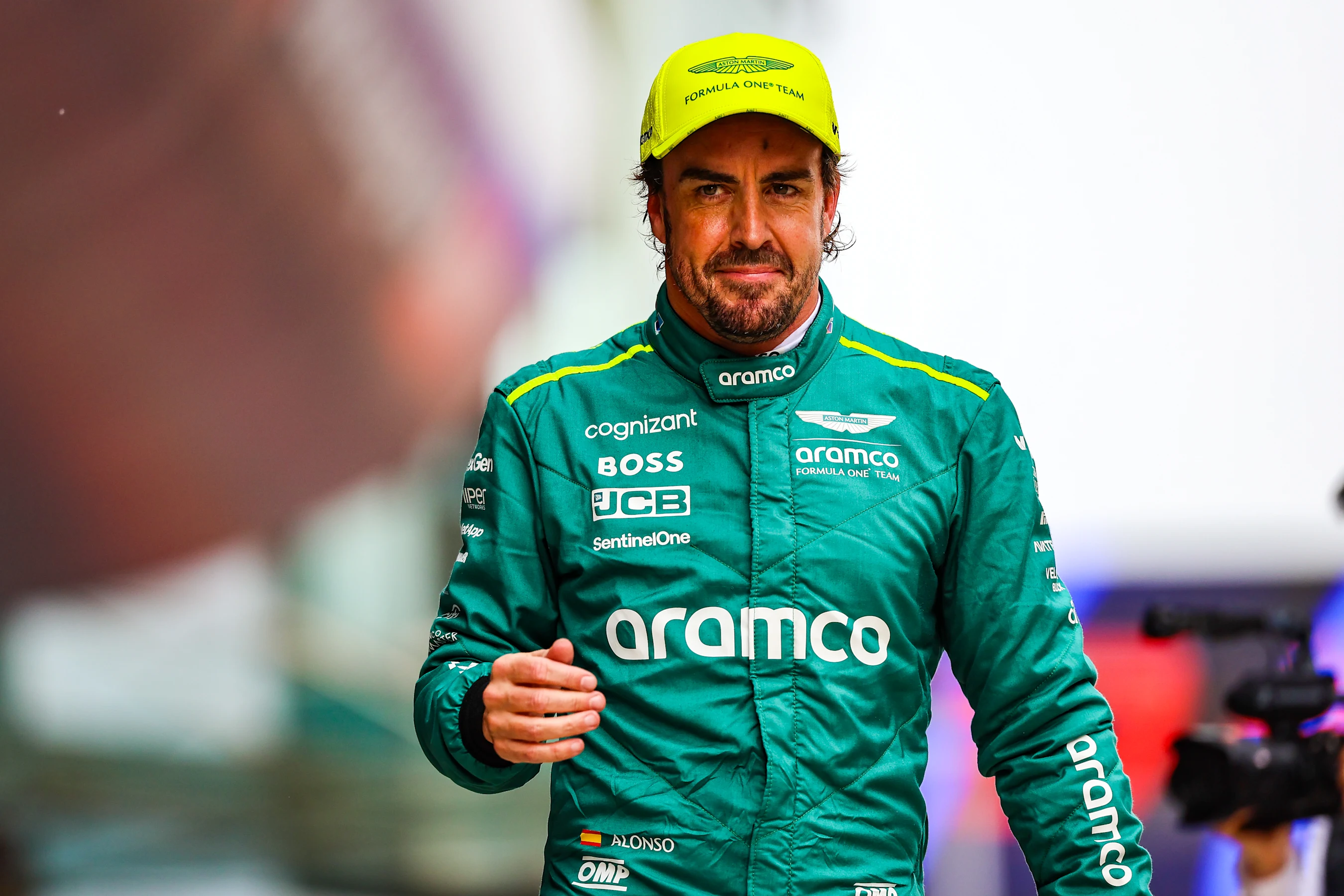 SHANGHAI, CHINA - APRIL 20: Fernando Alonso of Spain and Aston Martin F1 Team walks in parc ferme