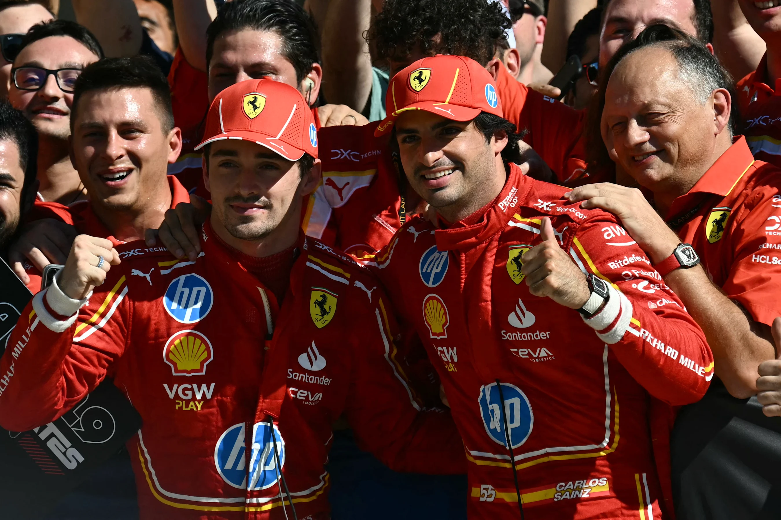 (L-R) Ferrari's Monegasque driver Charles Leclerc, Ferrari's Spanish driver Carlos Sainz Jr. and