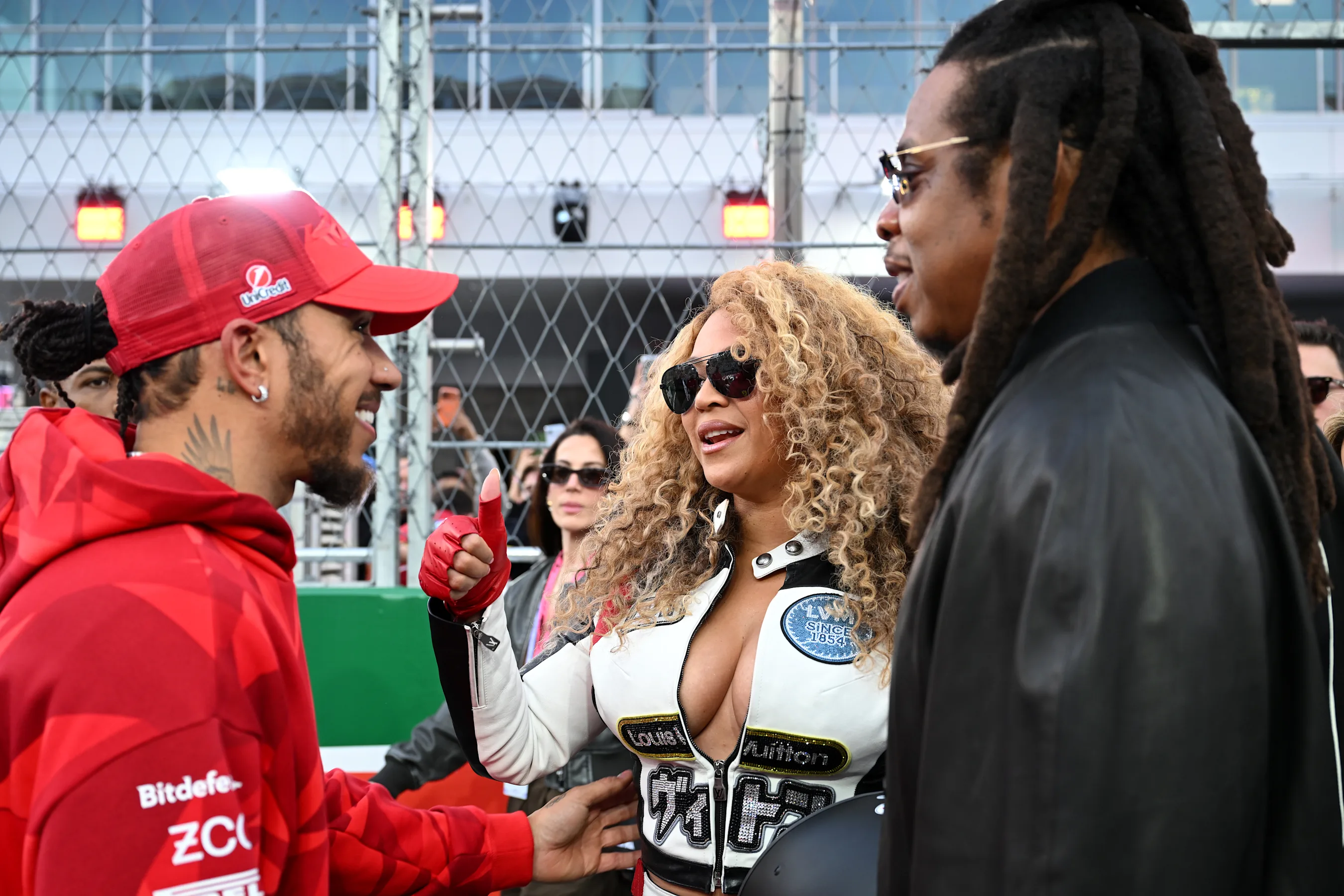 LAS VEGAS, NEVADA - NOVEMBER 22: Lewis Hamilton of Great Britain and Scuderia Ferrari talks with