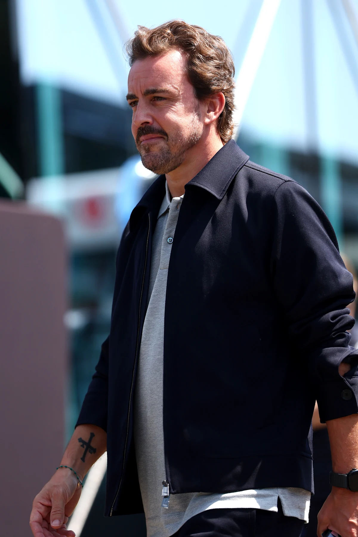 SPIELBERG, AUSTRIA - JUNE 26: Fernando Alonso of Spain and Aston Martin F1 Team looks on in the