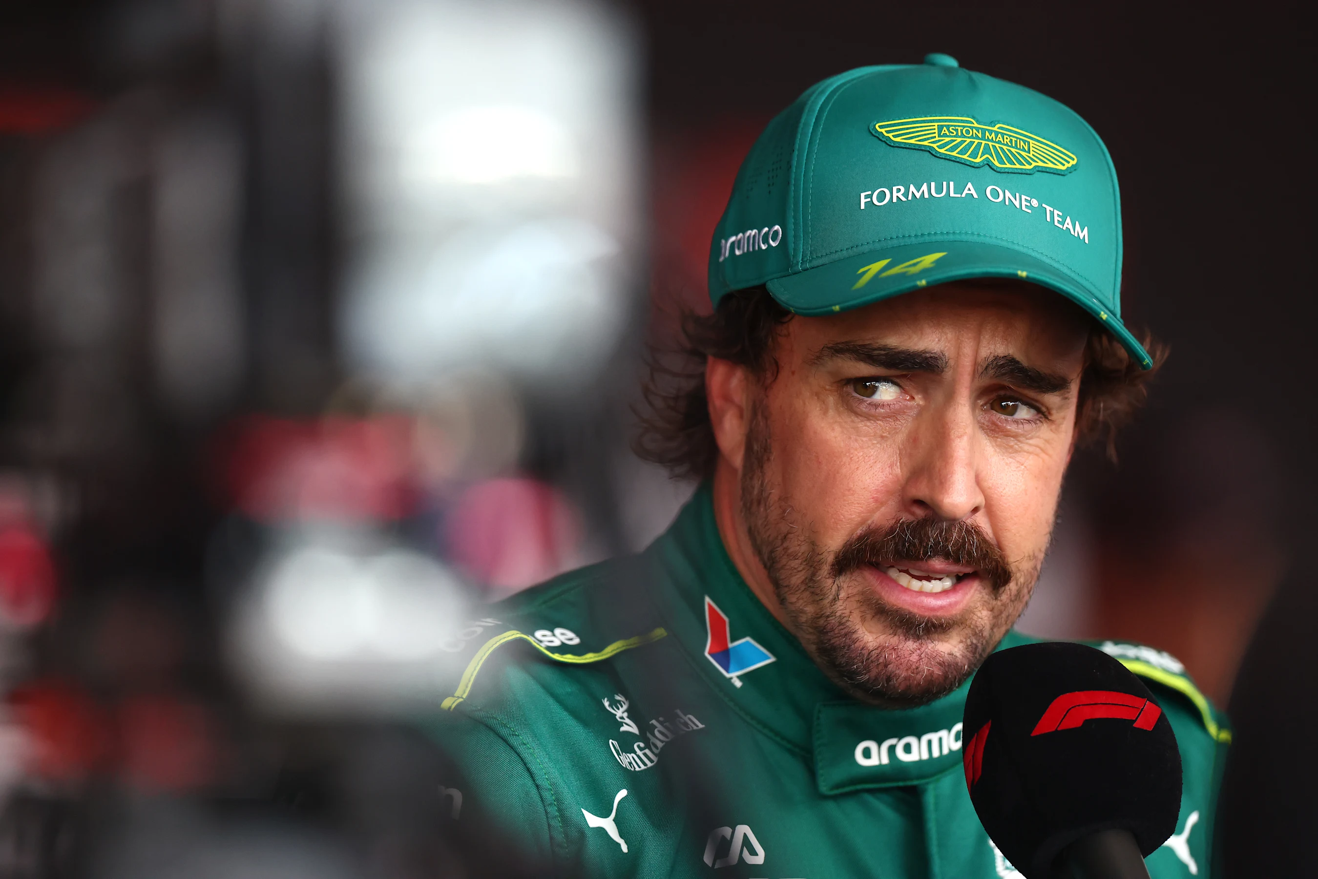 BUDAPEST, HUNGARY - AUGUST 01: Fernando Alonso of Spain and Aston Martin F1 Team is interviewed