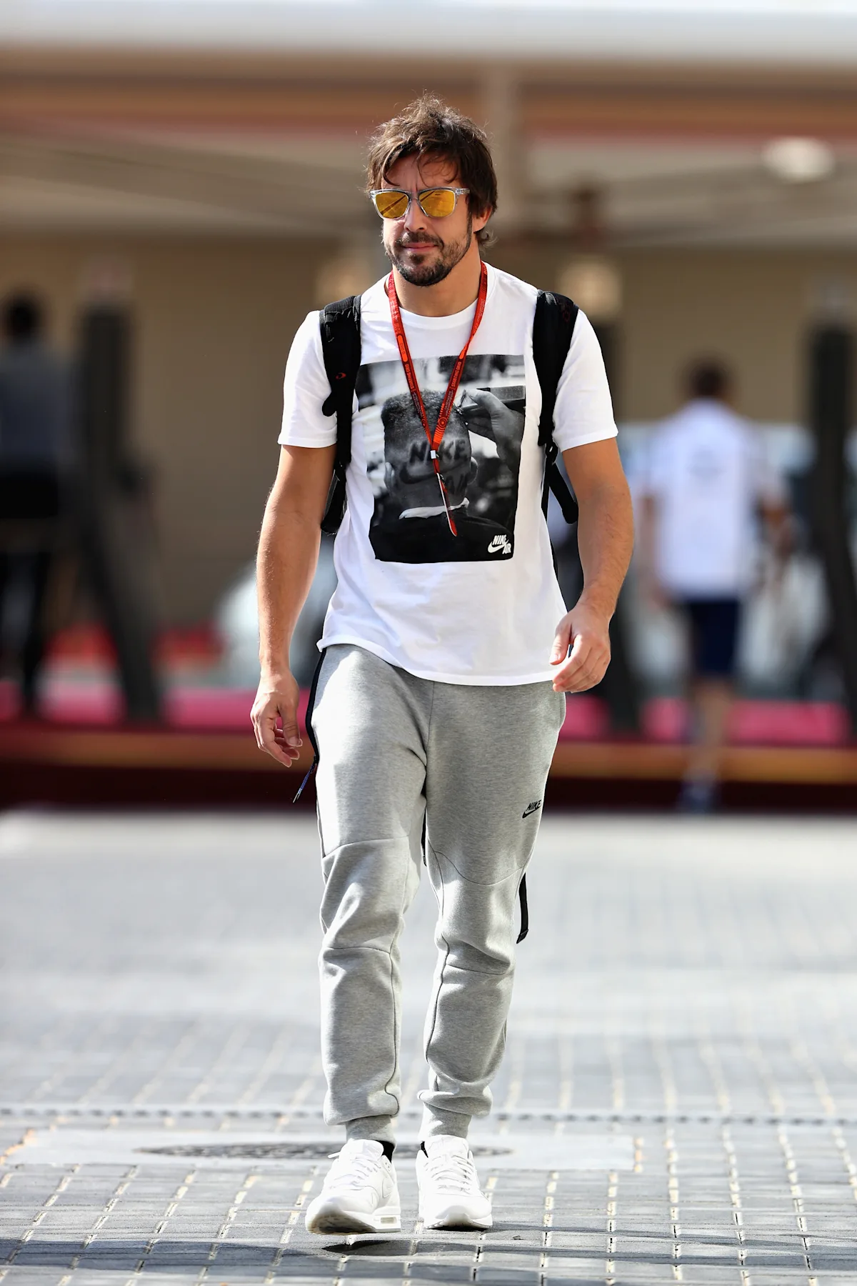 ABU DHABI, UNITED ARAB EMIRATES - NOVEMBER 24:  Fernando Alonso of Spain and McLaren Honda walks in