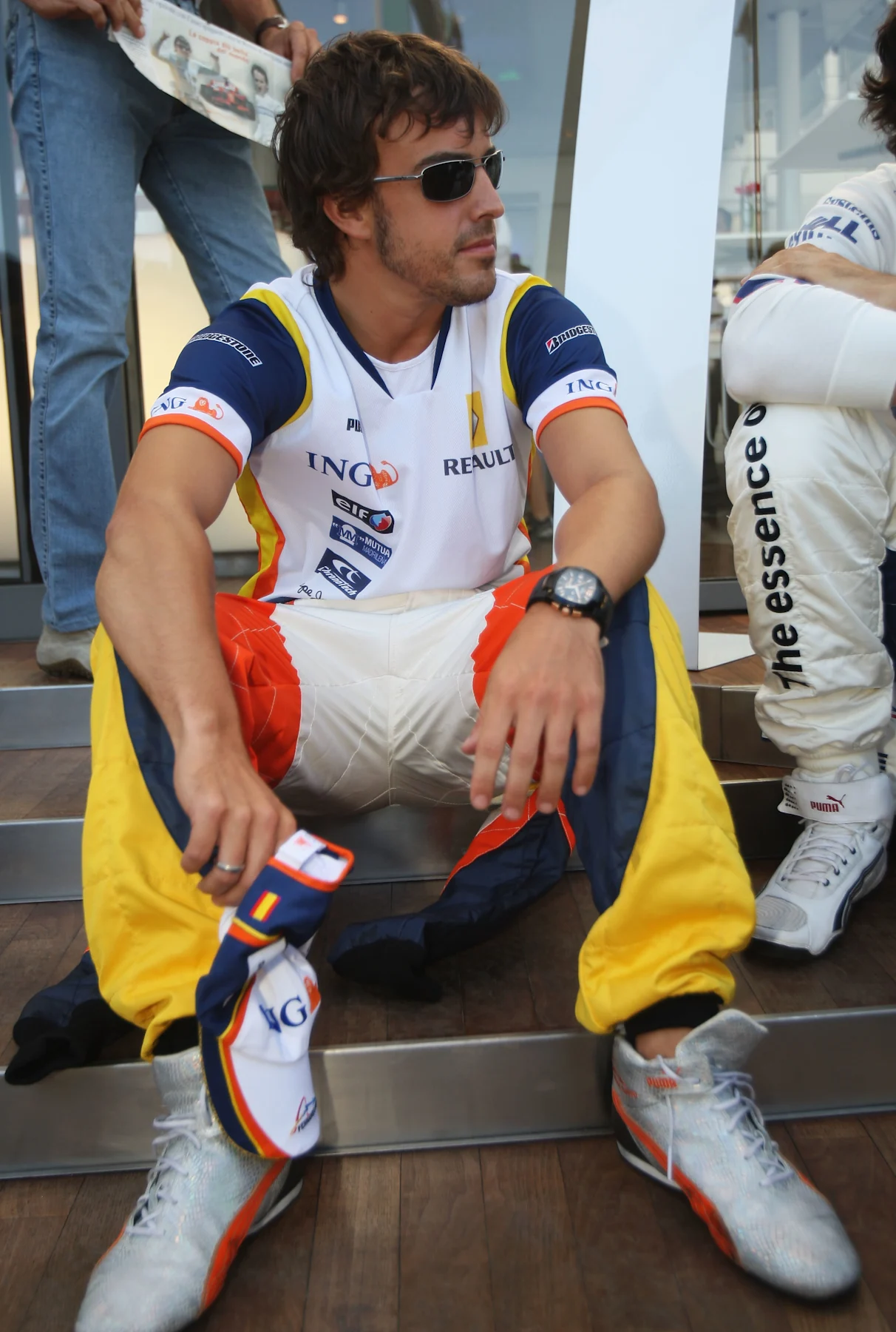 VALENCIA, SPAIN - AUGUST 21:  Fernando Alonso of Spain and Renault relaxes during previews to the