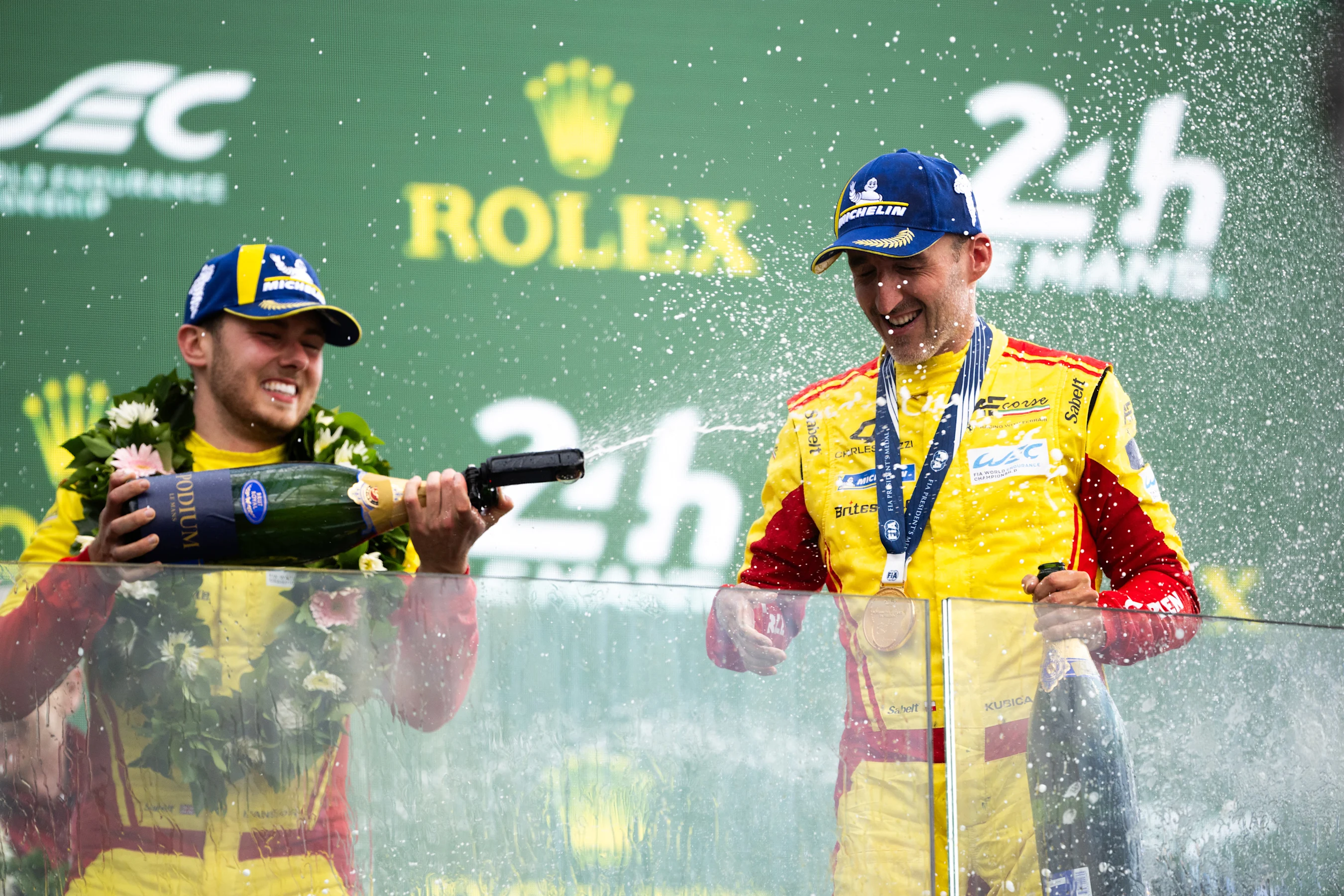 LE MANS, FRANCE - JUNE 15: Race winner Robert Kubica of Poland and #83 AF Corse Ferrari (Right)