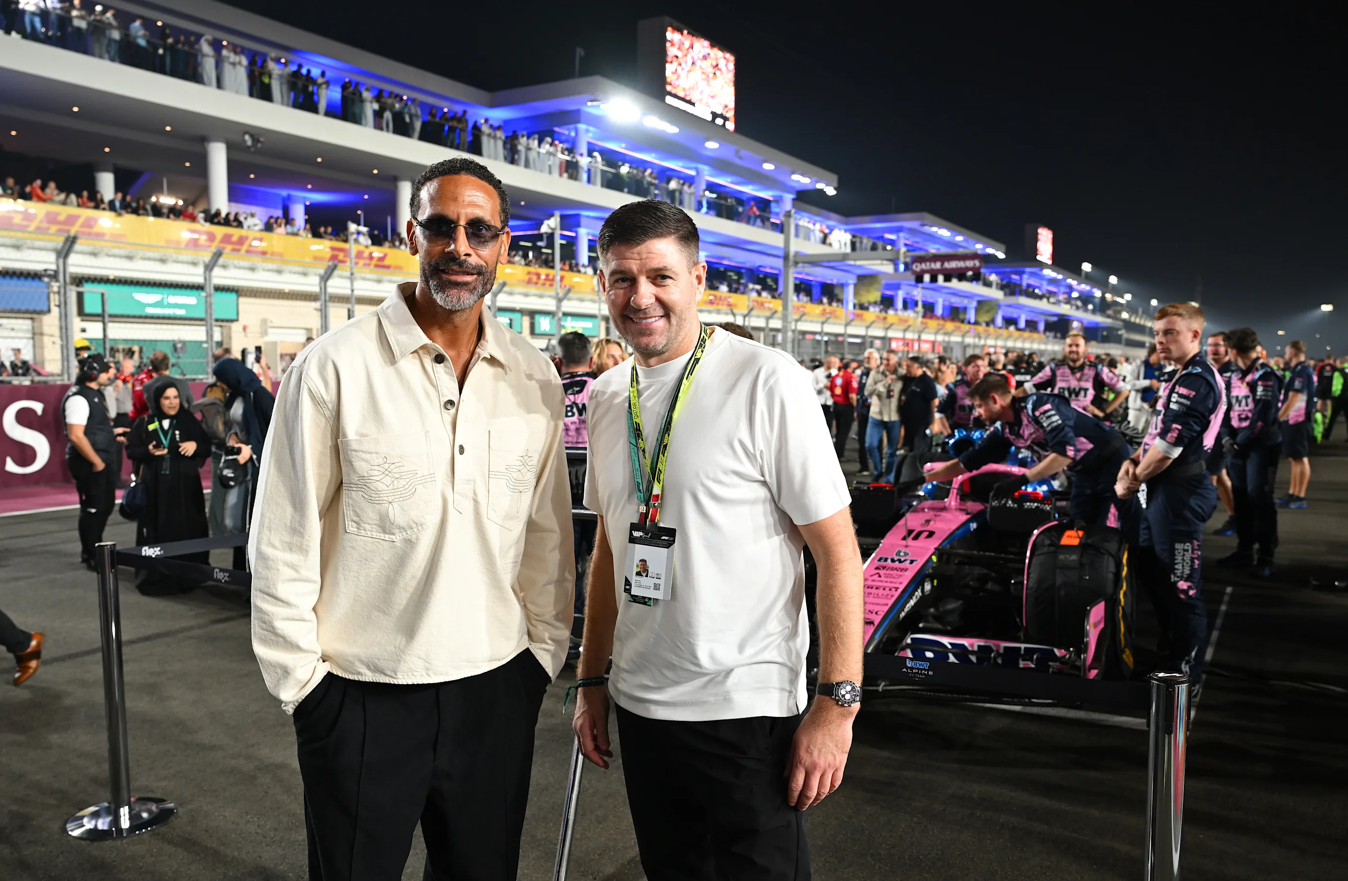 LUSAIL CITY, QATAR - NOVEMBER 30: Rio Ferdinand and Steven Gerrard on the grid with the Alpine F1