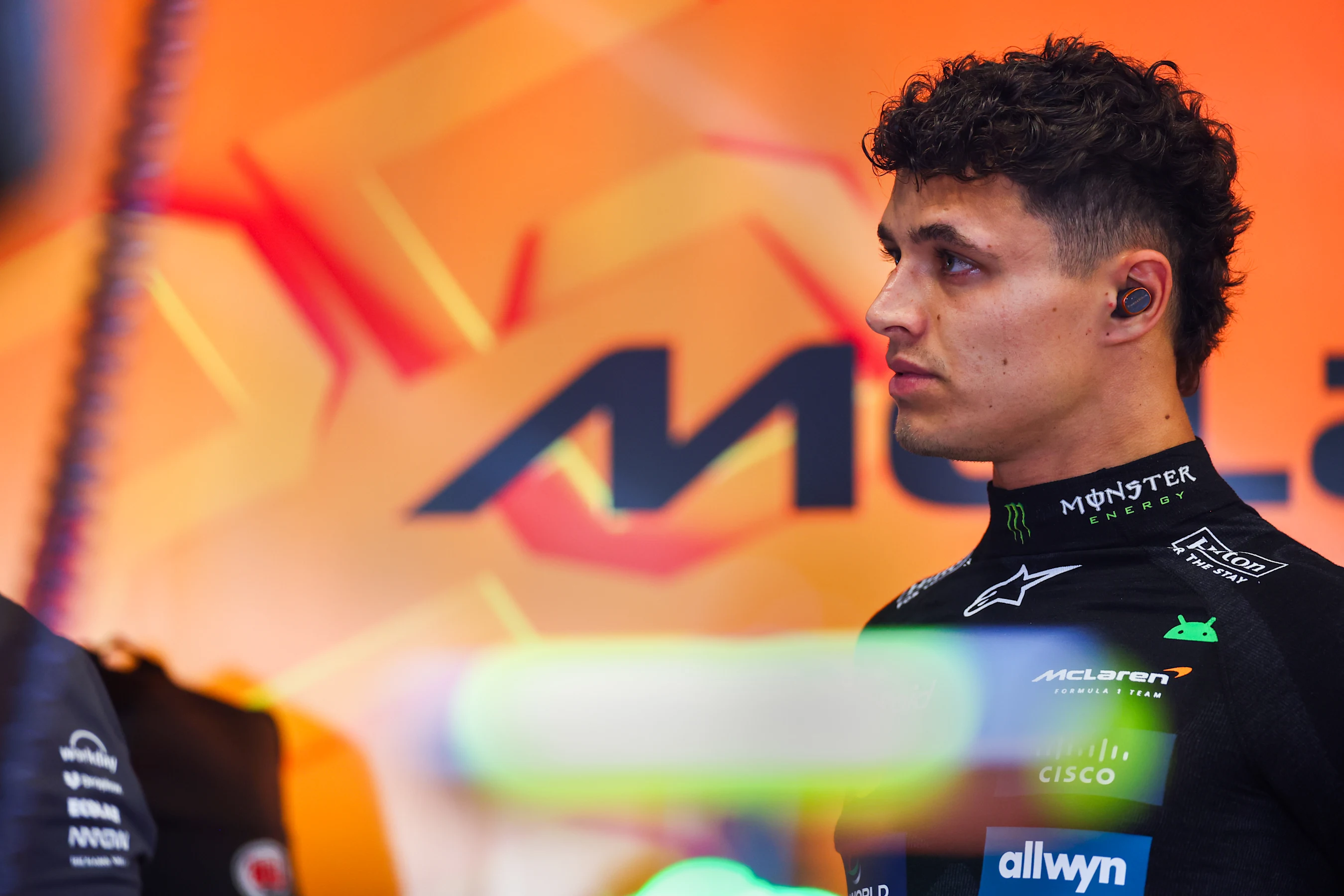JEDDAH, SAUDI ARABIA - APRIL 19: Lando Norris of Great Britain and McLaren looks on in the garage