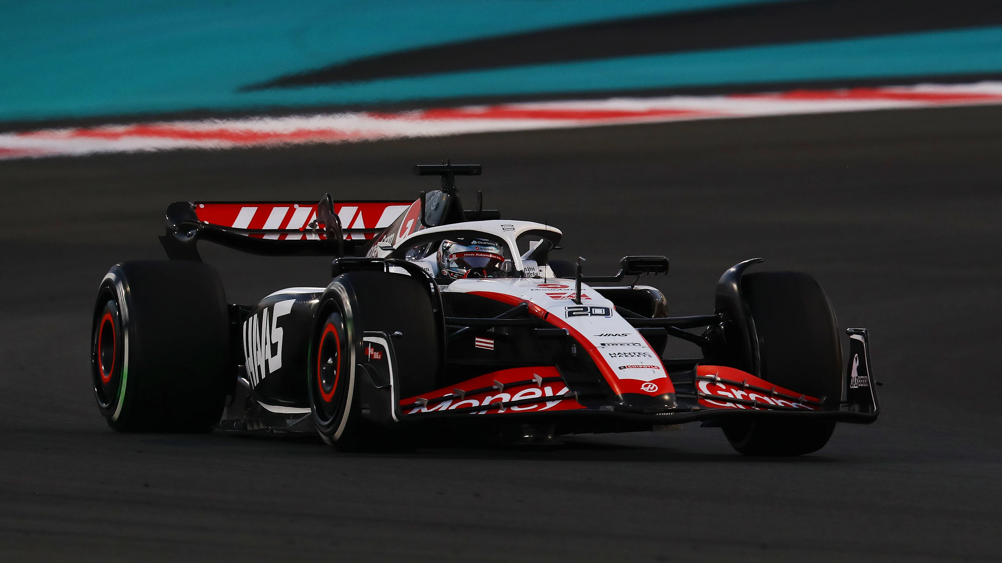 ABU DHABI, UNITED ARAB EMIRATES - NOVEMBER 26: Kevin Magnussen of Denmark driving the (20) Haas F1