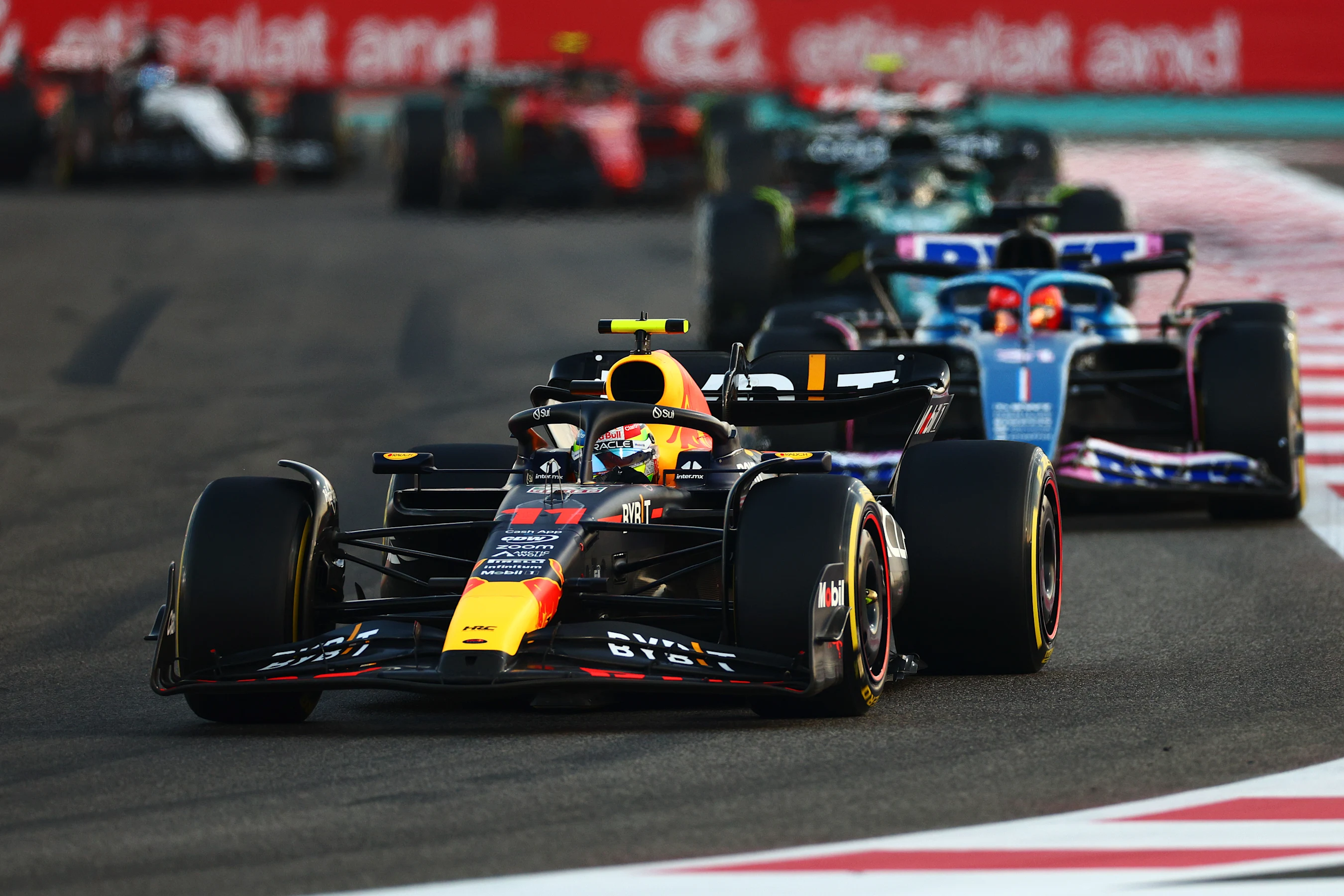 ABU DHABI, UNITED ARAB EMIRATES - NOVEMBER 26: Sergio Perez of Mexico driving the (11) Oracle Red