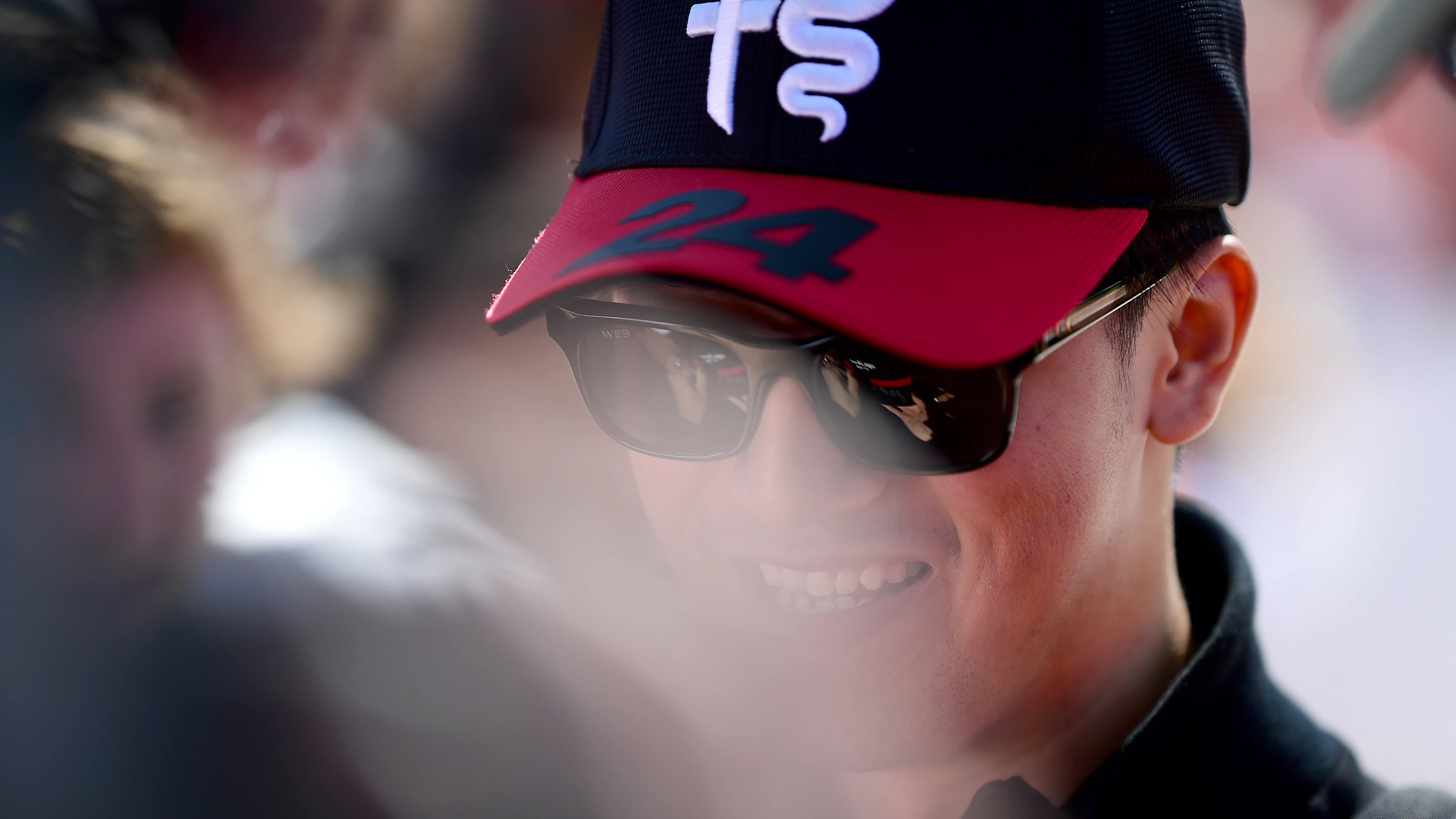 MELBOURNE, AUSTRALIA - APRIL 02: Zhou Guanyu of China and Alfa Romeo F1 greets fans on the