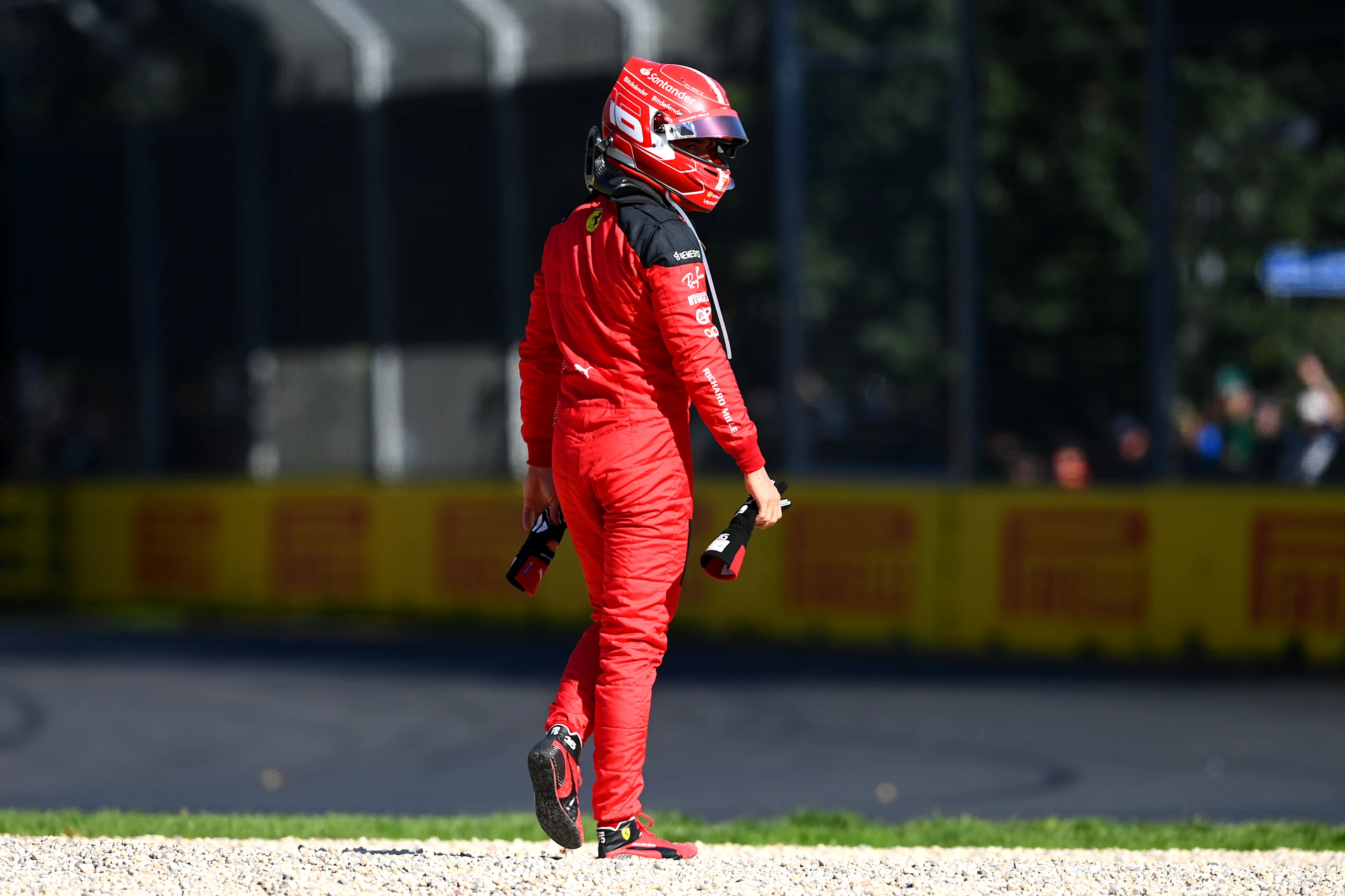 MELBOURNE, AUSTRALIA - APRIL 02: Charles Leclerc of Monaco and Ferrari walks from his car after