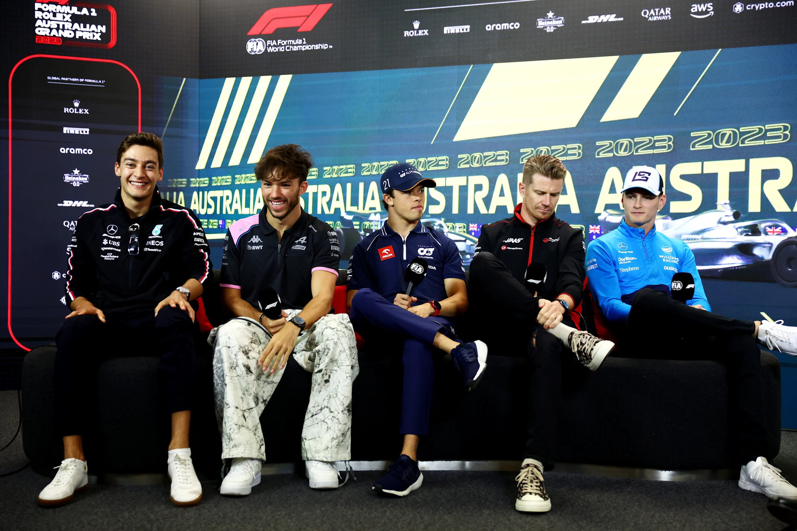 MELBOURNE, AUSTRALIA - MARCH 30: George Russell of Great Britain and Mercedes, Pierre Gasly of