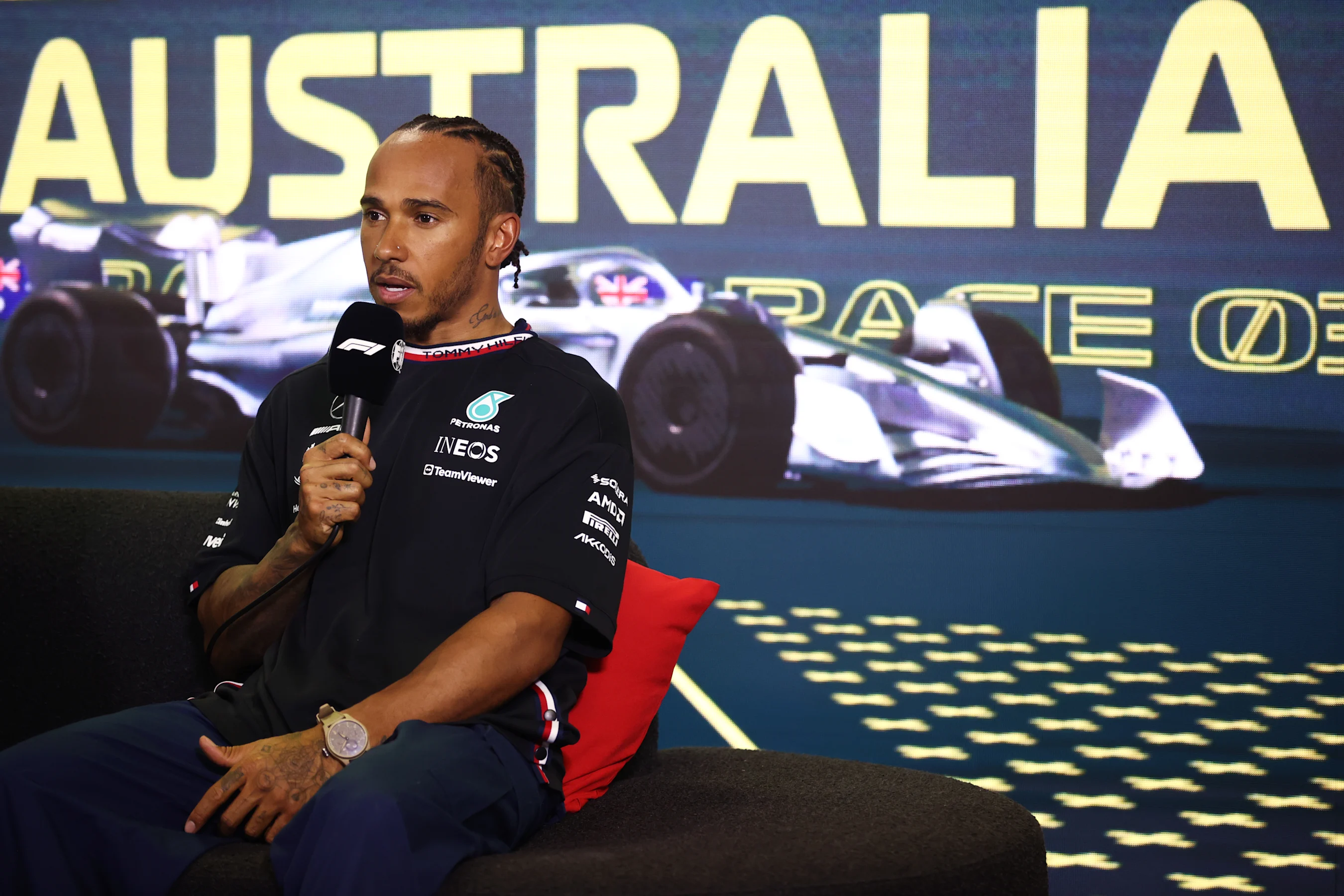 MELBOURNE, AUSTRALIA - APRIL 01: Third placed qualifier Lewis Hamilton of Great Britain and