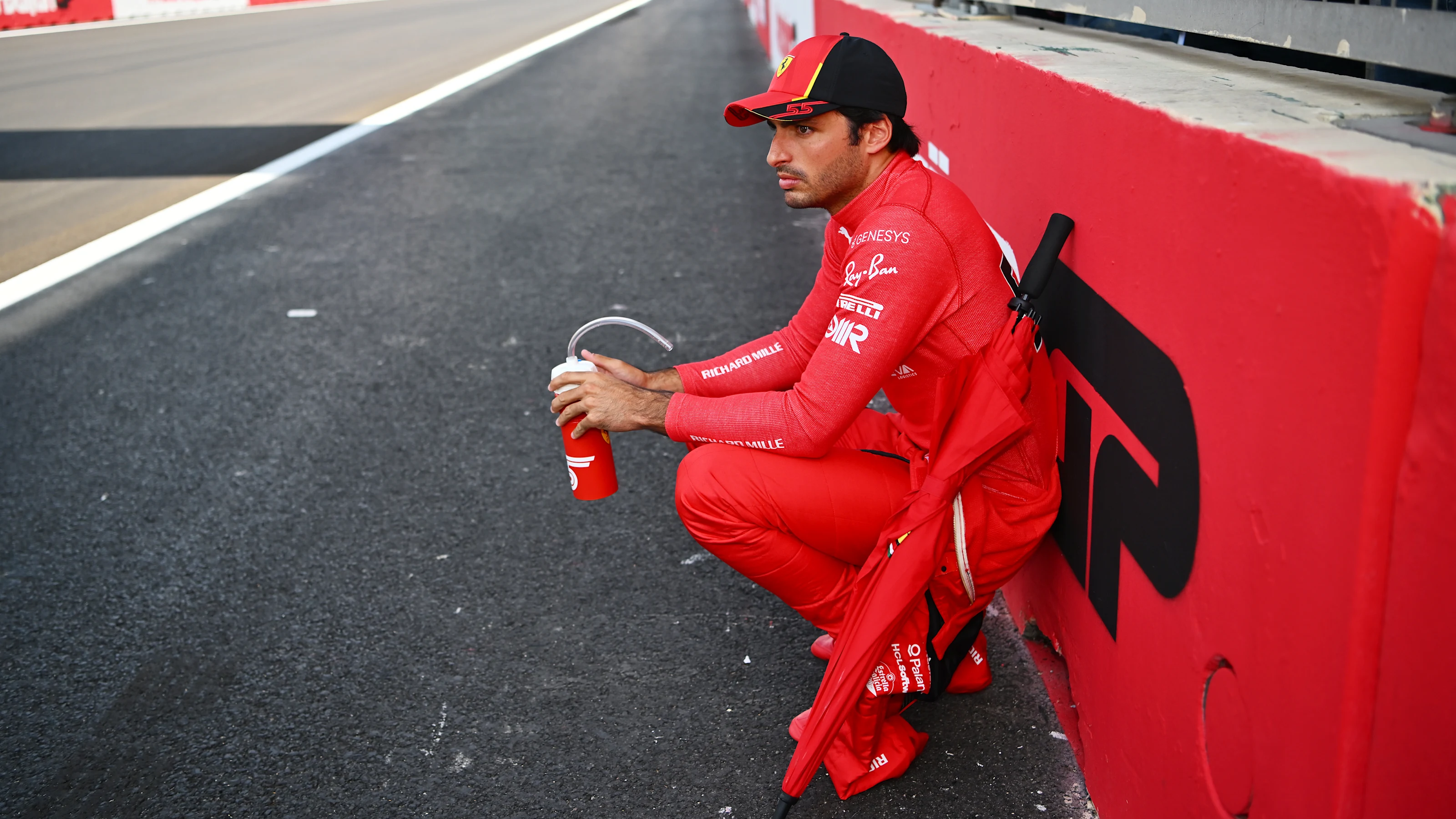BAKU, AZERBAIJAN - APRIL 30: Carlos Sainz of Spain and Ferrari looks on on the grid prior to the F1