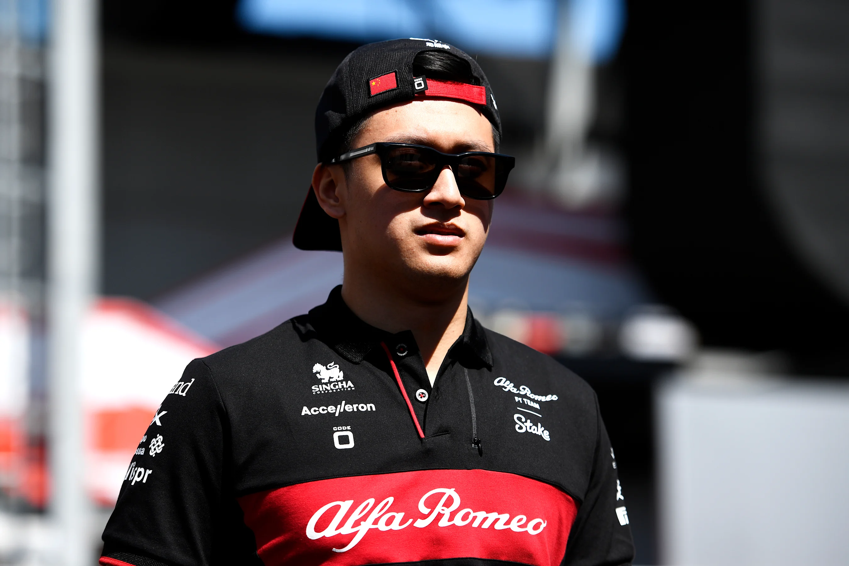 BAKU, AZERBAIJAN - APRIL 27: Zhou Guanyu of China and Alfa Romeo F1 looks on in the Paddock during