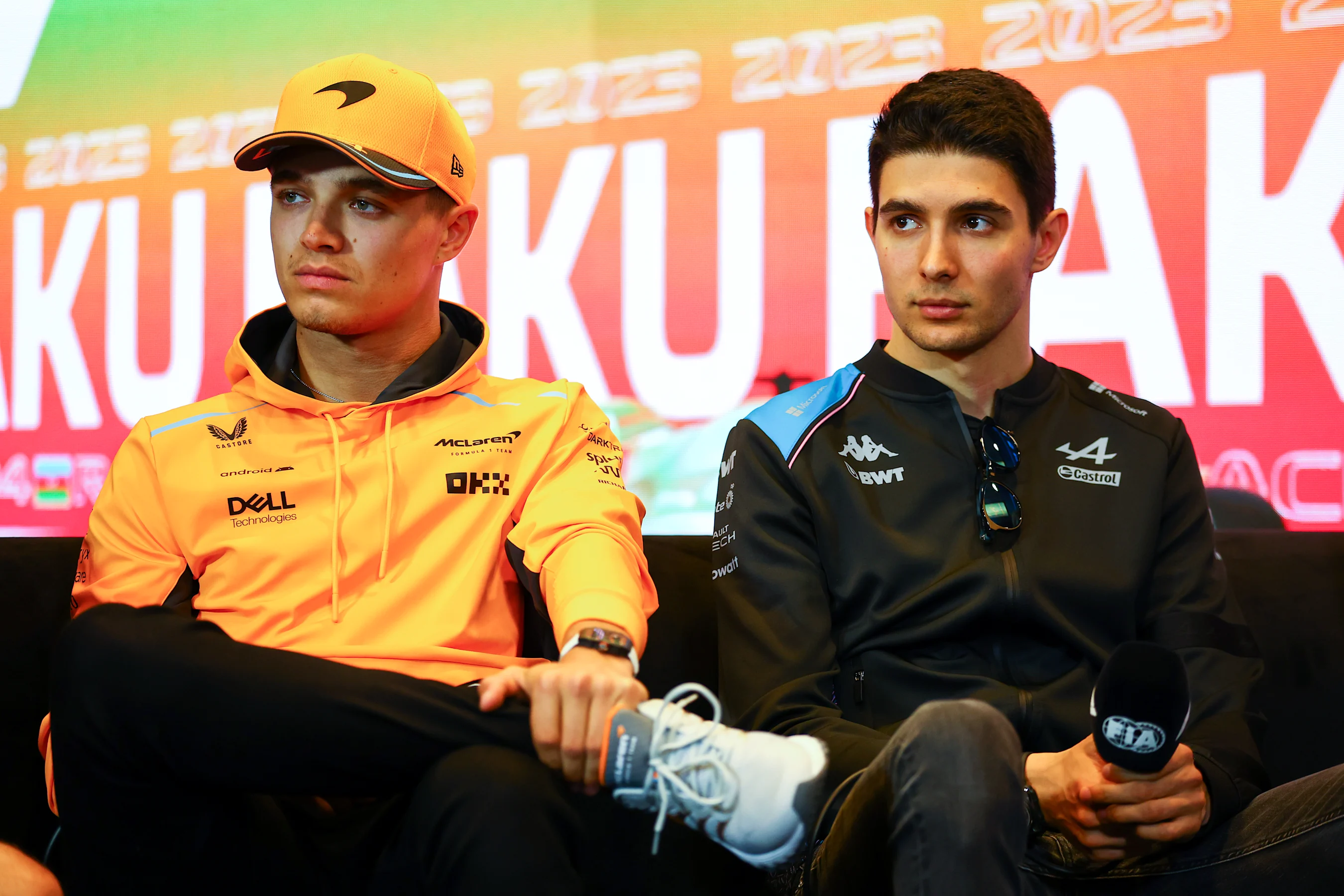 BAKU, AZERBAIJAN - APRIL 27: Lando Norris of Great Britain and McLaren and Esteban Ocon of France