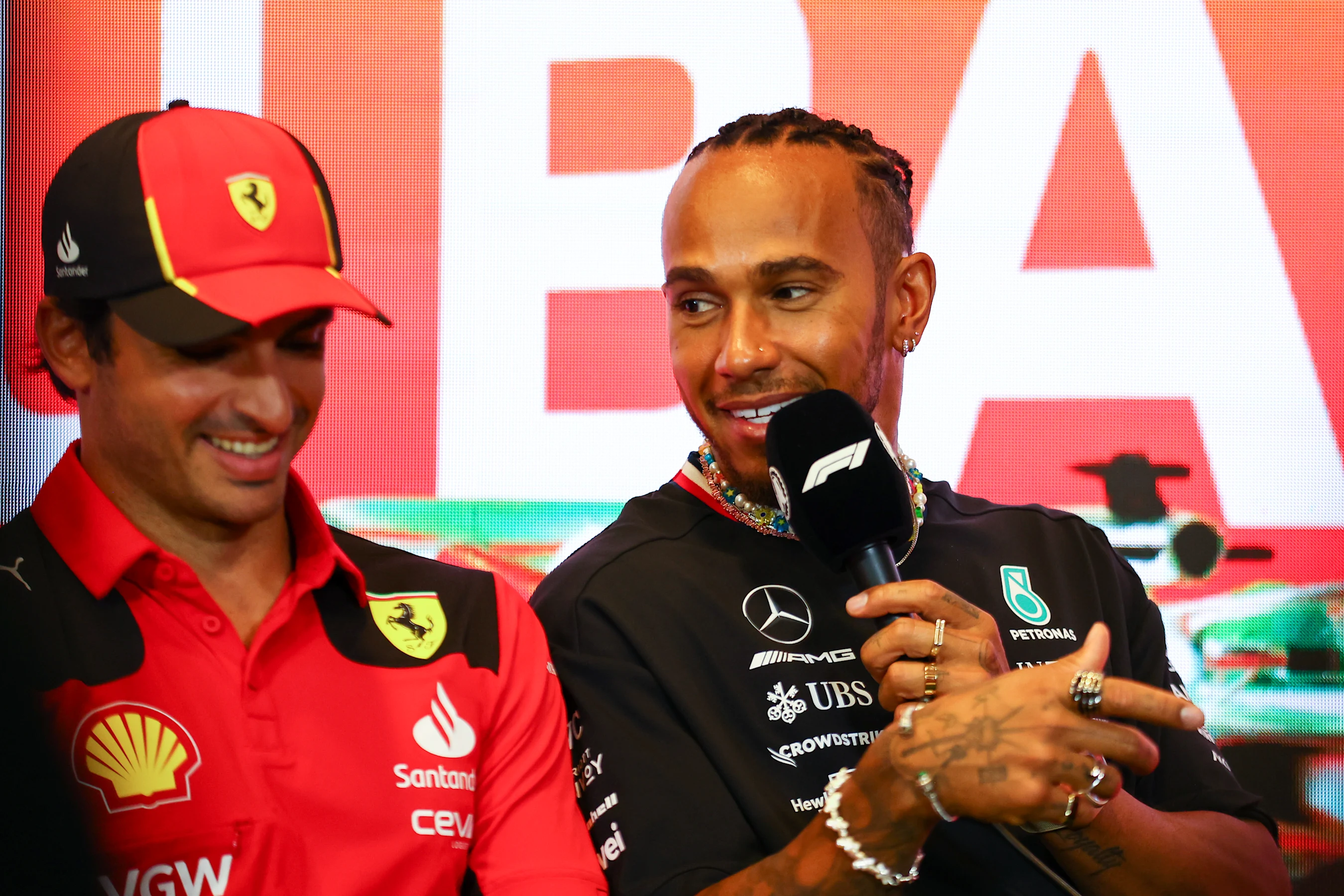 BAKU, AZERBAIJAN - APRIL 27: Lewis Hamilton of Great Britain and Mercedes and Carlos Sainz of Spain