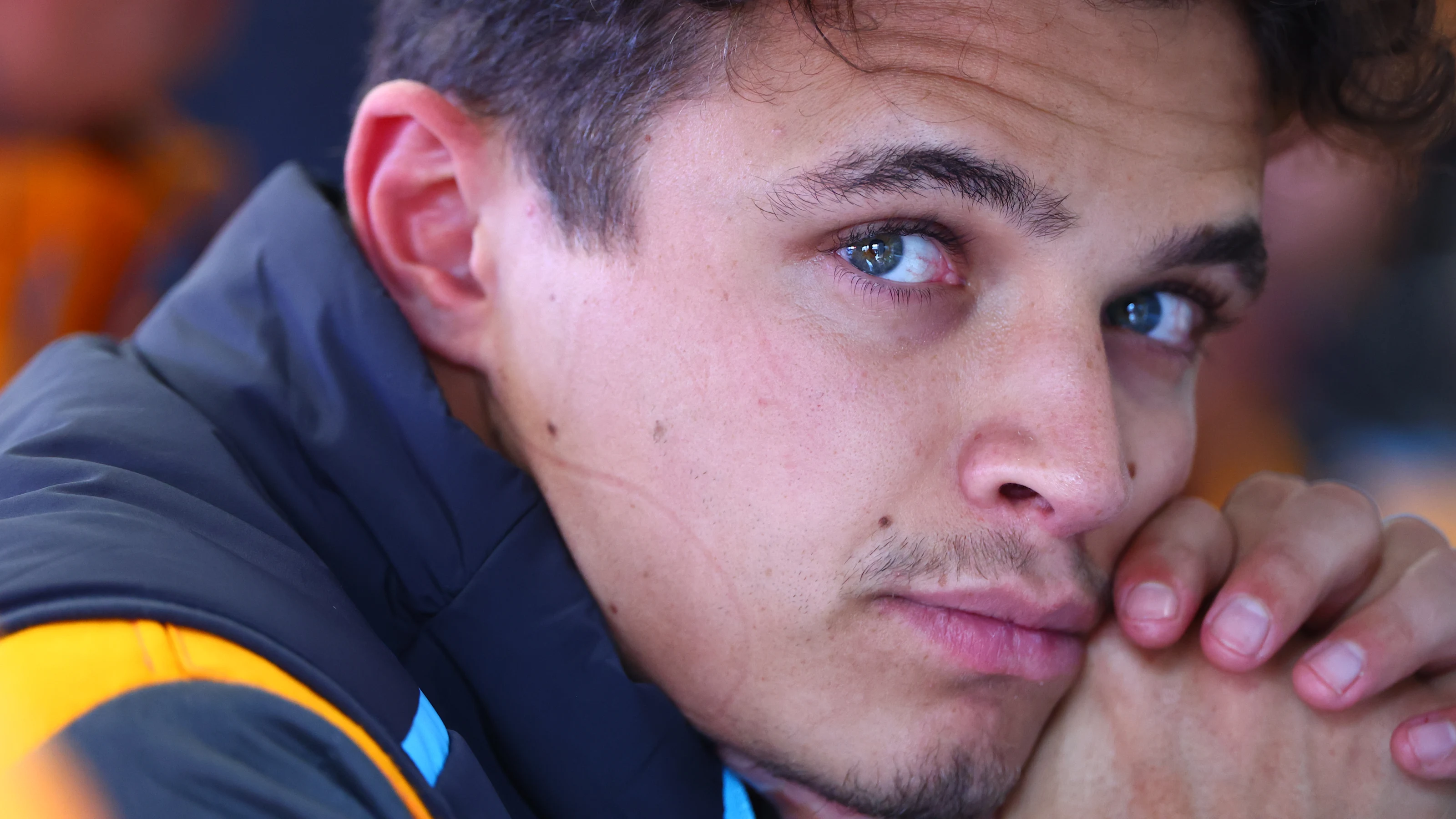 SPA, BELGIUM - JULY 28: Lando Norris of Great Britain and McLaren looks on in the garage during