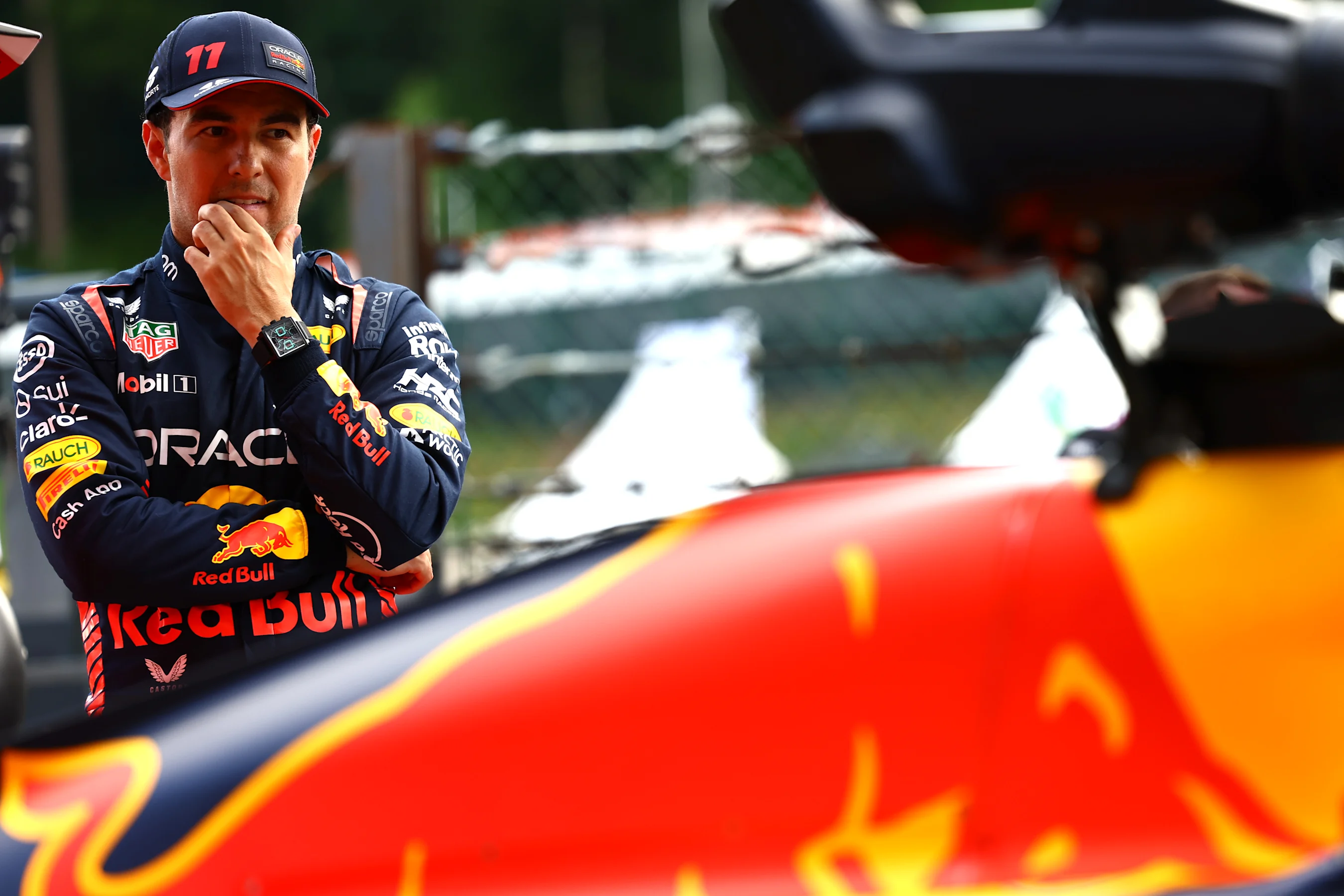 SPA, BELGIUM - JULY 28: Third placed qualifier Sergio Perez of Mexico and Oracle Red Bull Racing