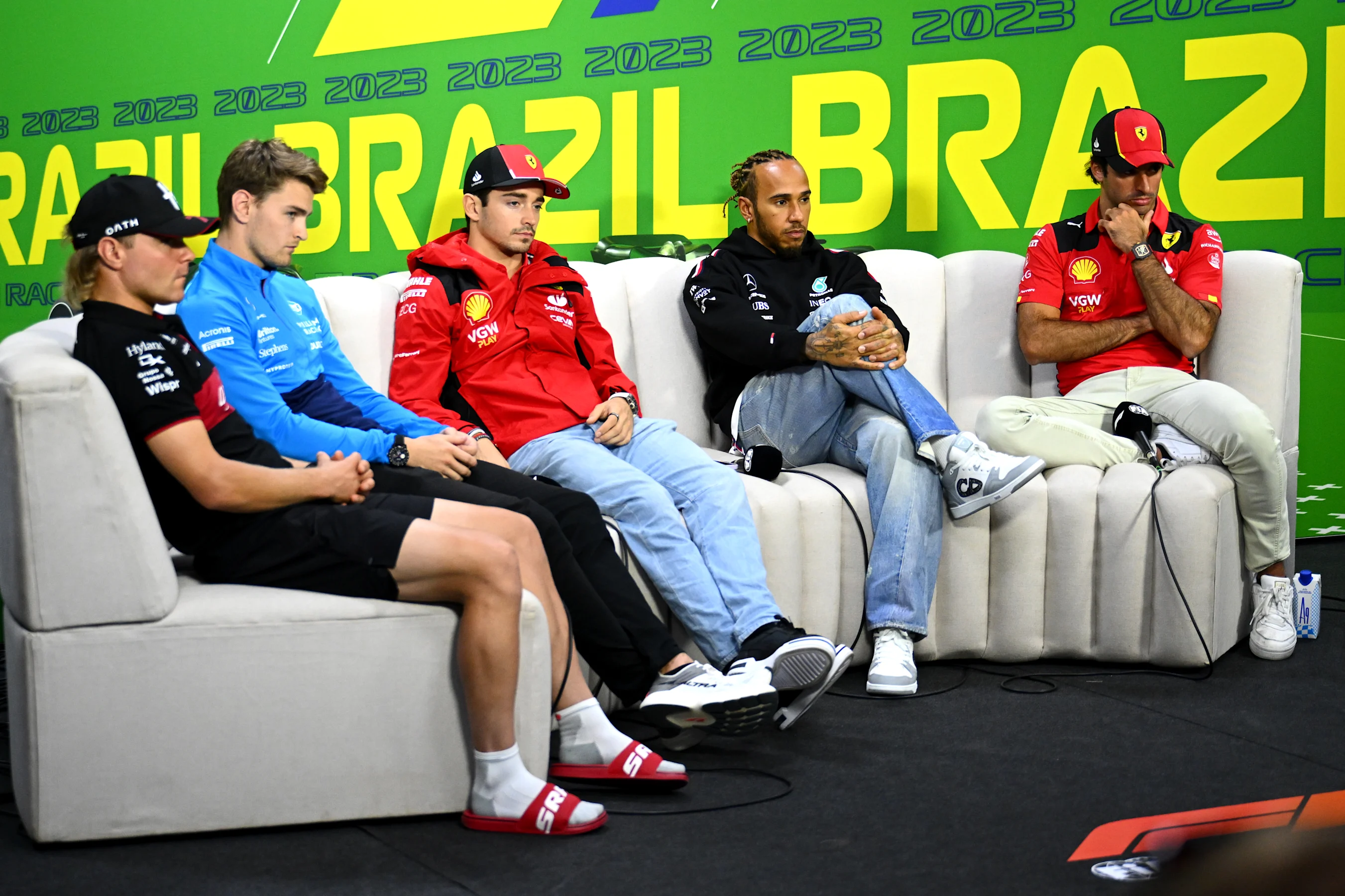 SAO PAULO, BRAZIL - NOVEMBER 02: Valtteri Bottas of Finland and Alfa Romeo F1, Logan Sargeant of