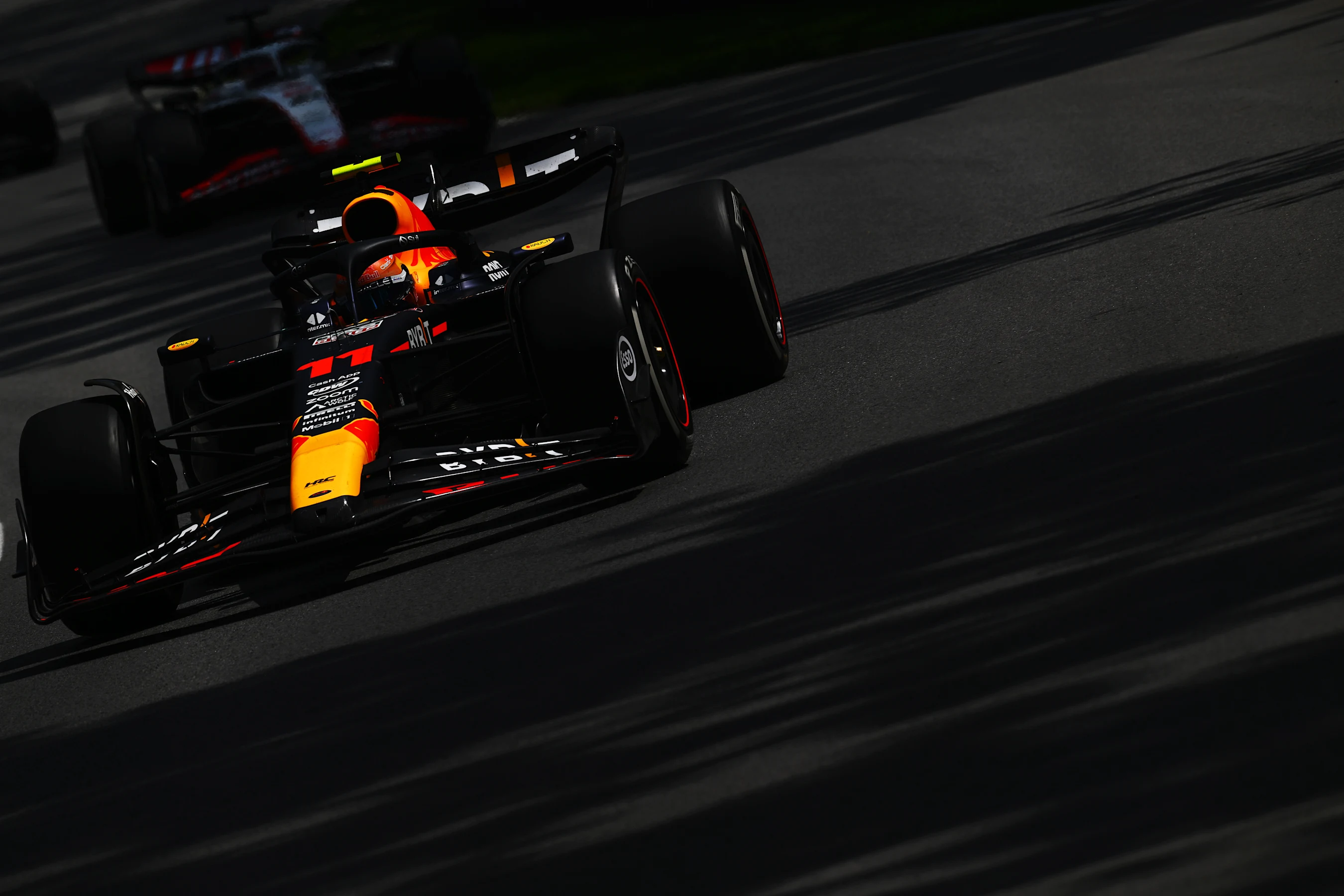 MONTREAL, QUEBEC - JUNE 18: Sergio Perez of Mexico driving the (11) Oracle Red Bull Racing RB19 on