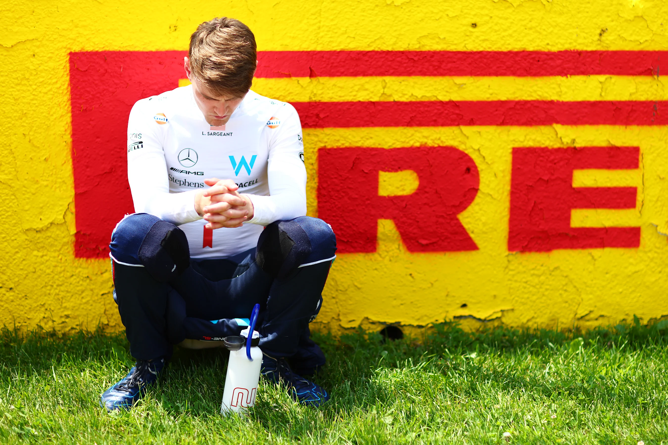 MONTREAL, QUEBEC - JUNE 18: Logan Sargeant of United States and Williams looks on, on the grid