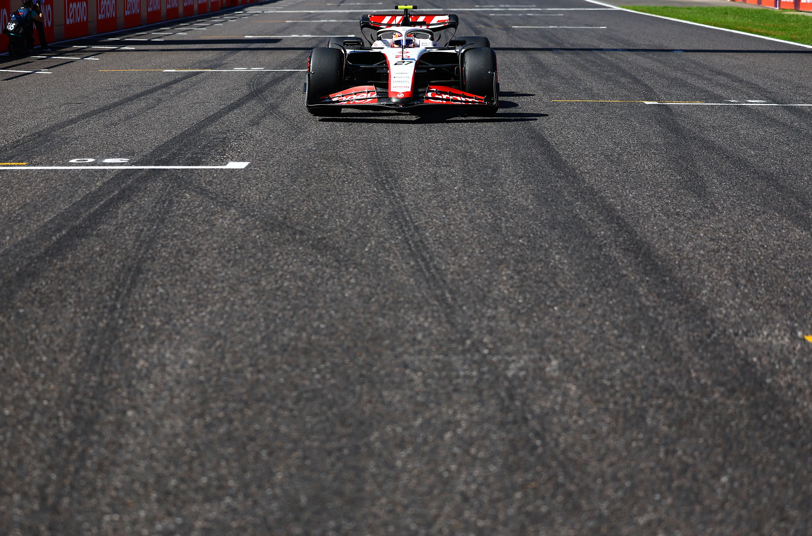 SUZUKA, JAPAN - SEPTEMBER 24: Nico Hulkenberg of Germany and Haas F1 prepares to drive on the grid