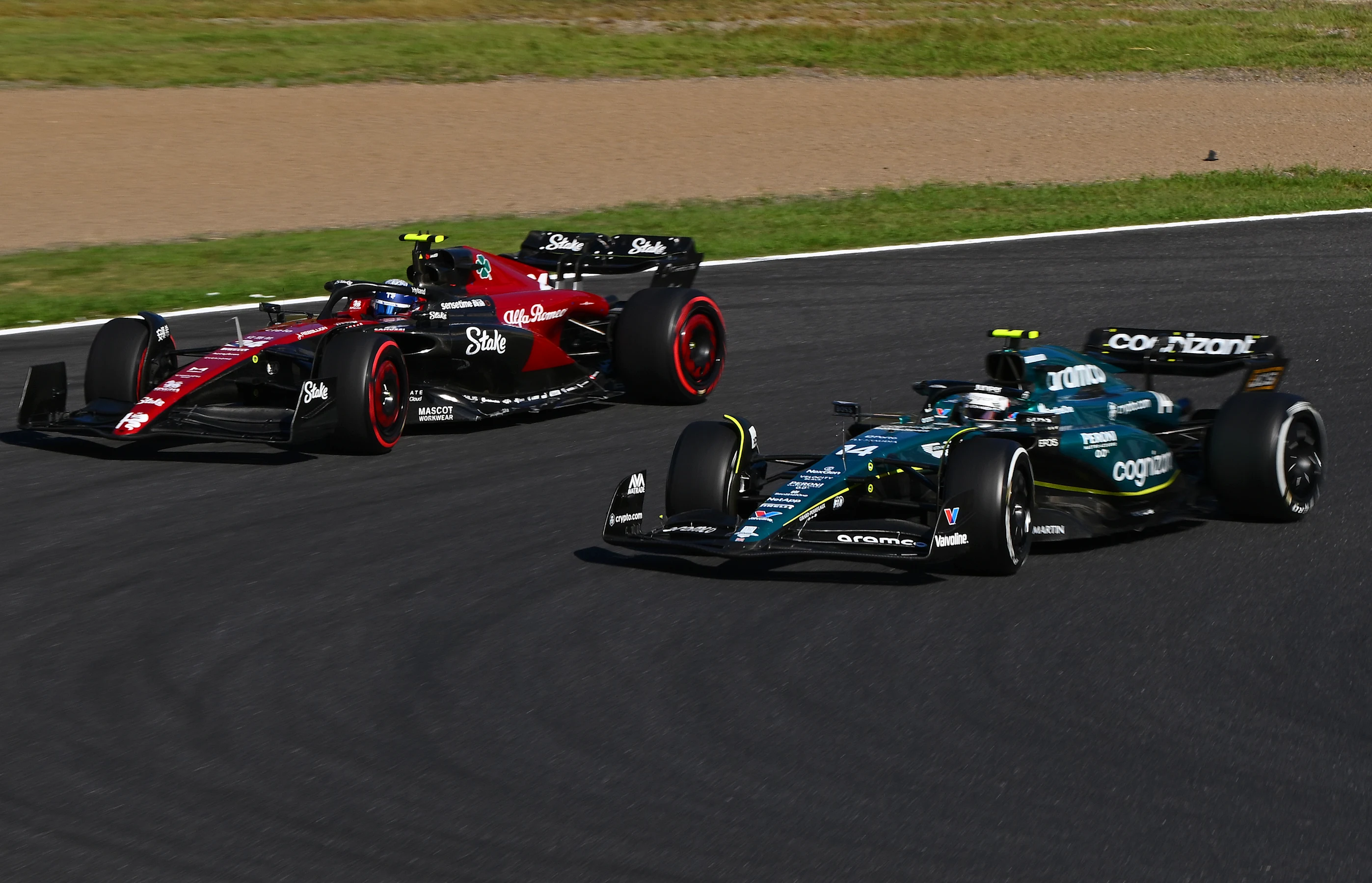 SUZUKA, JAPAN - SEPTEMBER 24: Fernando Alonso of Spain driving the (14) Aston Martin AMR23 Mercedes