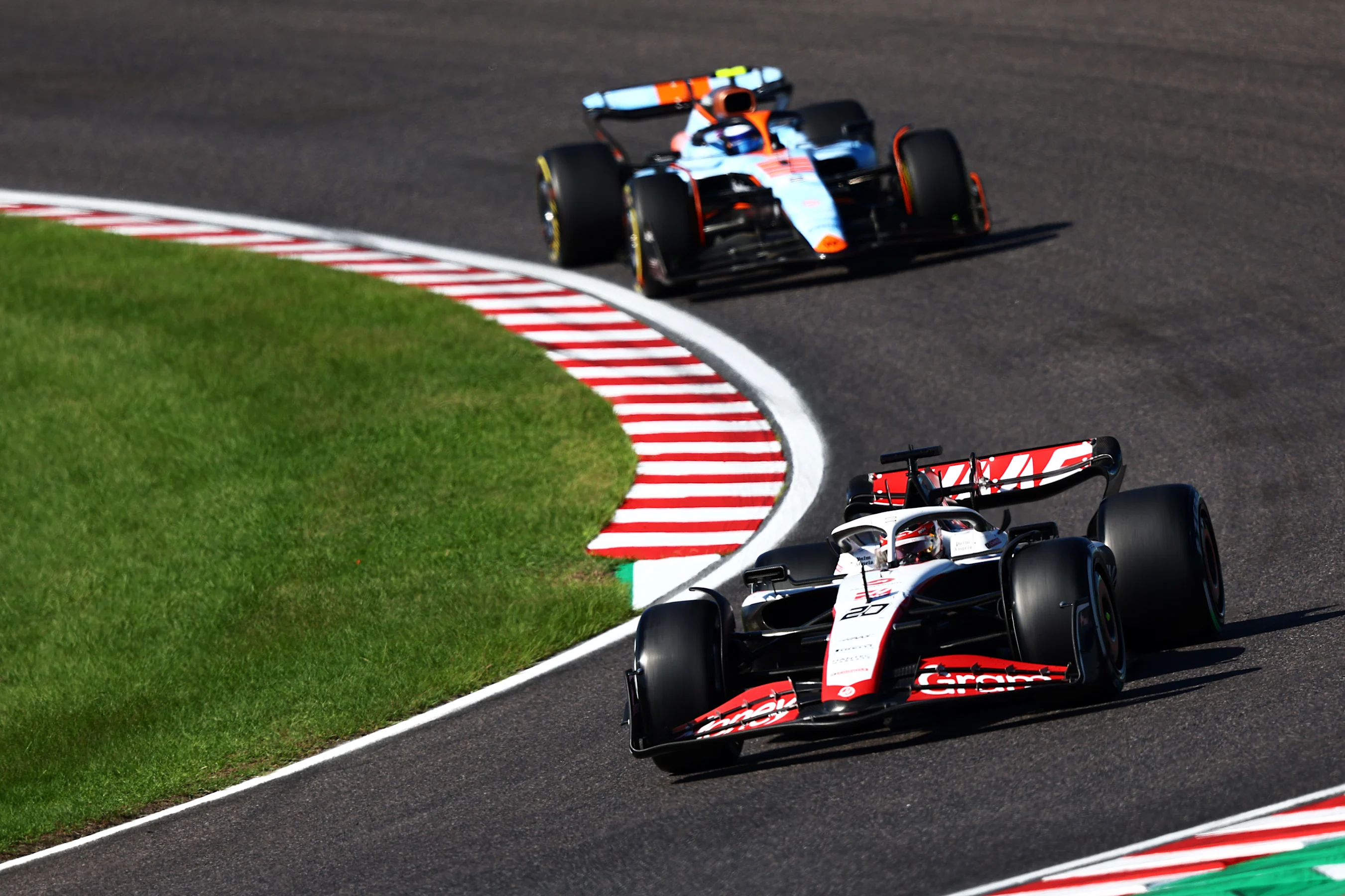 SUZUKA, JAPAN - SEPTEMBER 24: Kevin Magnussen of Denmark driving the (20) Haas F1 VF-23 Ferrari