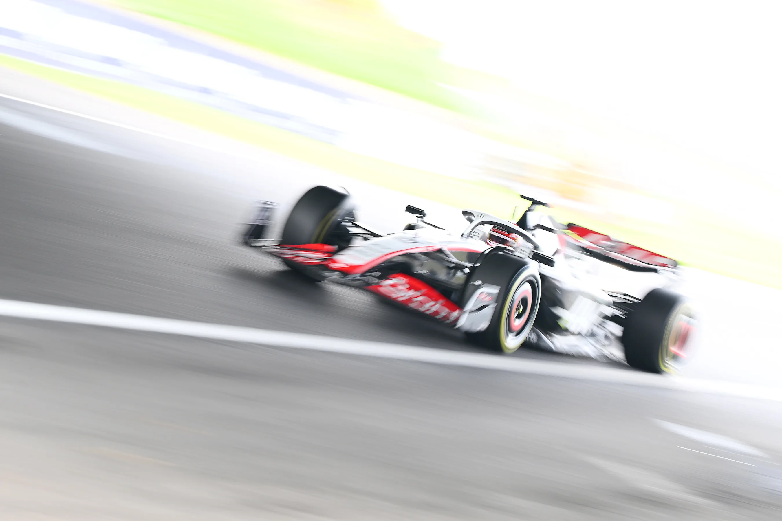 SUZUKA, JAPAN - SEPTEMBER 22: Kevin Magnussen of Denmark driving the (20) Haas F1 VF-23 Ferrari on