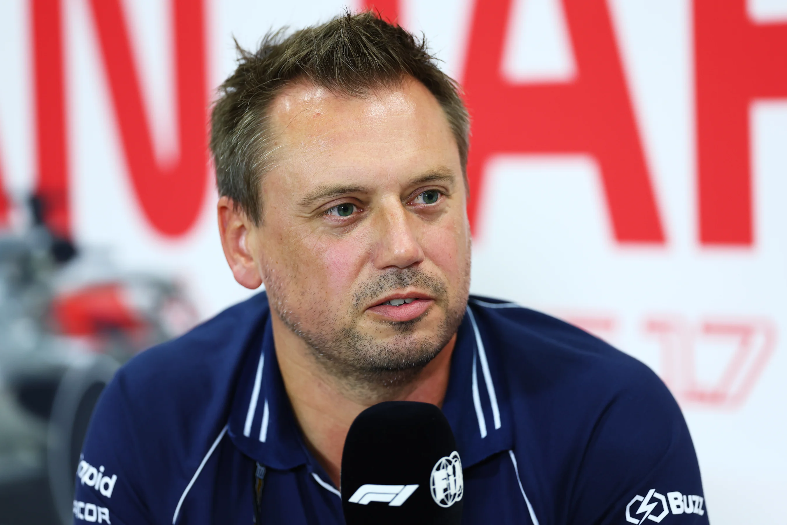 SUZUKA, JAPAN - SEPTEMBER 22: Jonathan Eddolls, Head of Trackside Engineering for Scuderia