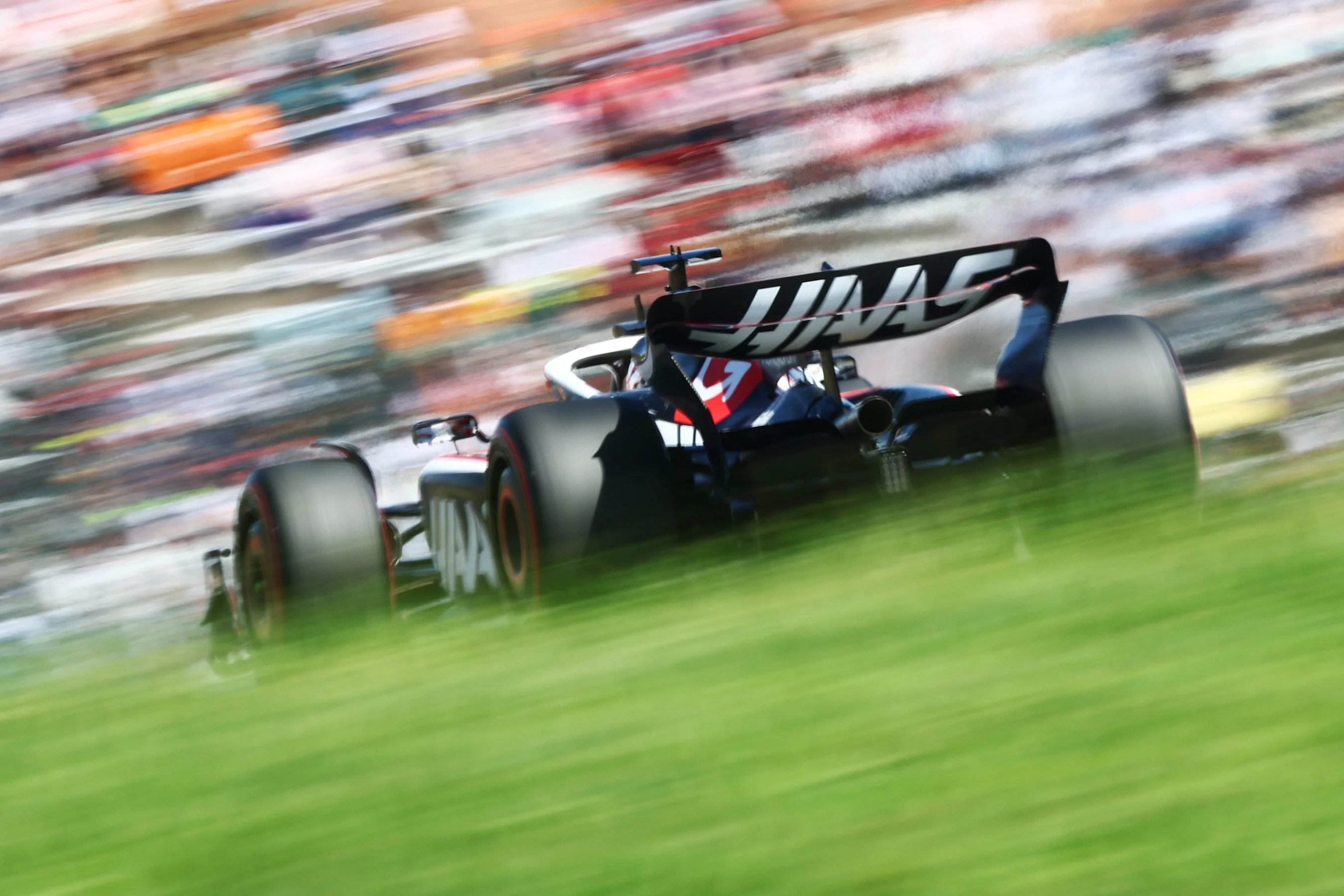 SUZUKA, JAPAN - SEPTEMBER 23: Kevin Magnussen of Denmark driving the (20) Haas F1 VF-23 Ferrari on