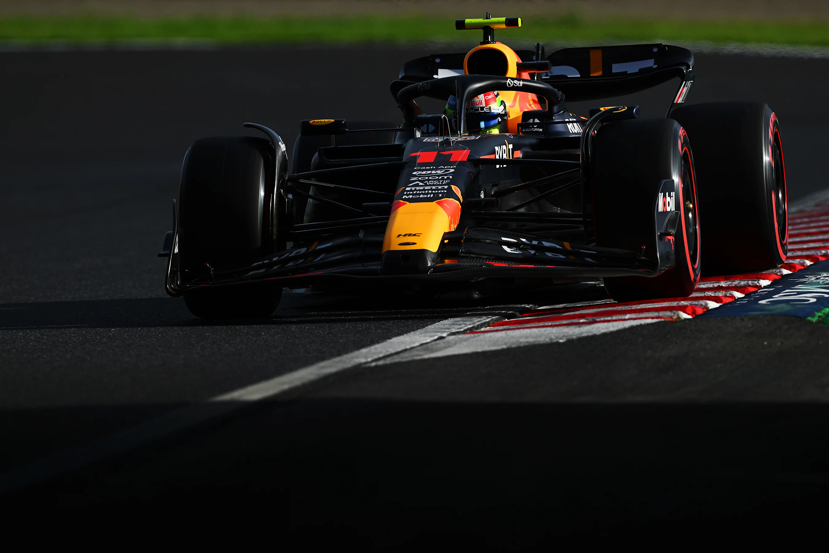SUZUKA, JAPAN - SEPTEMBER 23: Sergio Perez of Mexico driving the (11) Oracle Red Bull Racing RB19