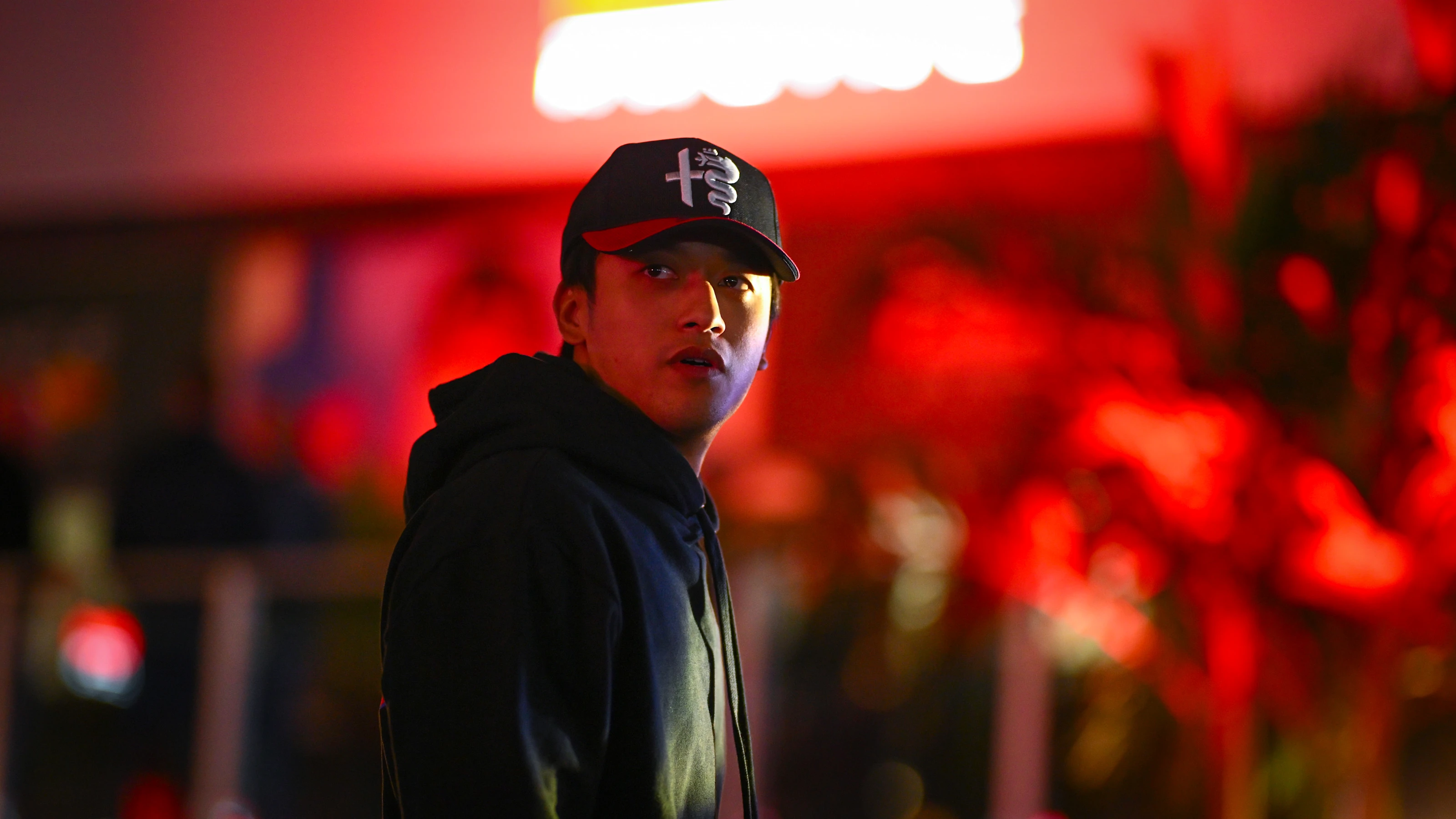 LAS VEGAS, NEVADA - NOVEMBER 16: Zhou Guanyu of China and Alfa Romeo F1 walks in the Paddock prior