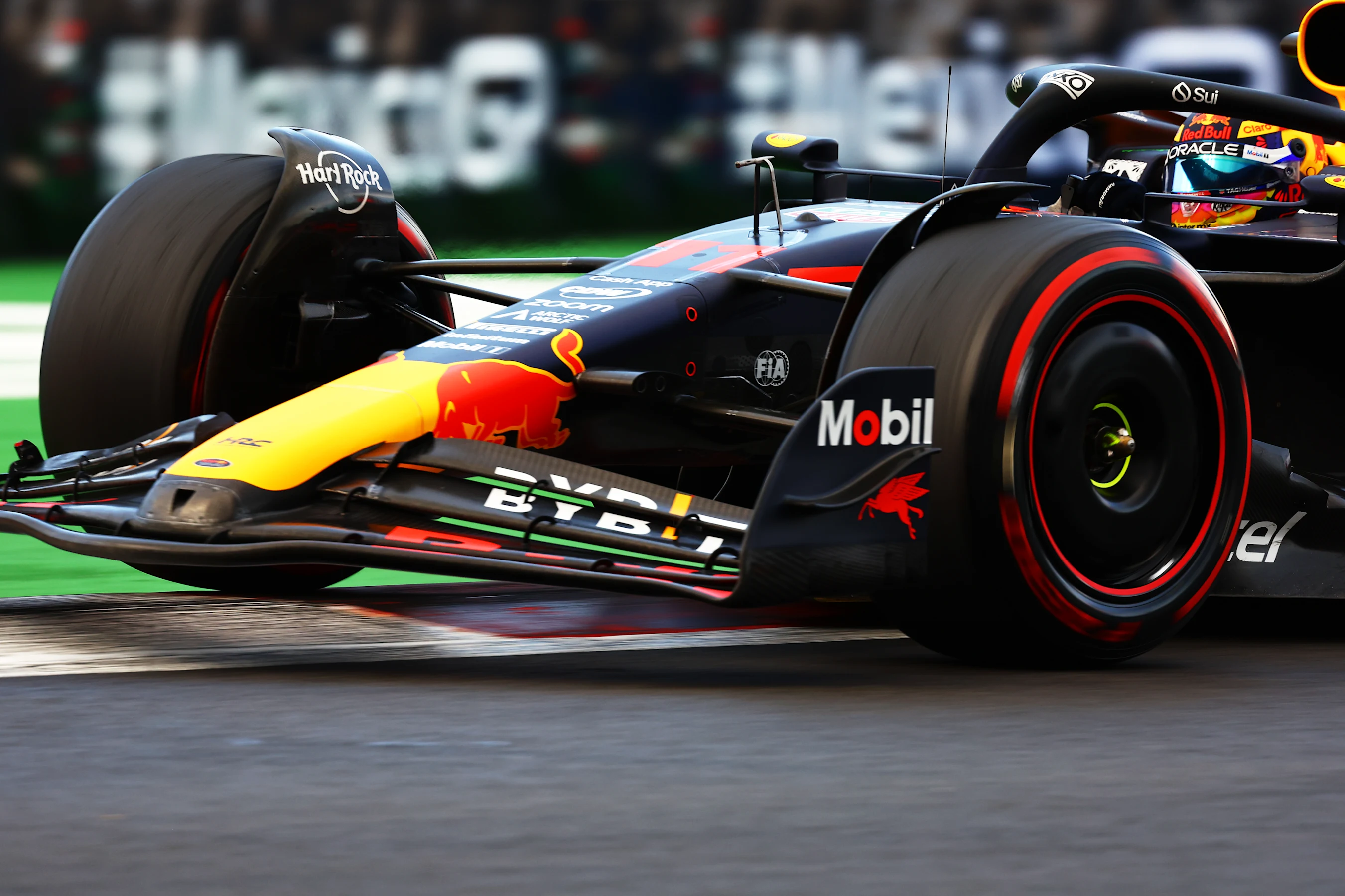 MEXICO CITY, MEXICO - OCTOBER 27: Sergio Perez of Mexico driving the (11) Oracle Red Bull Racing